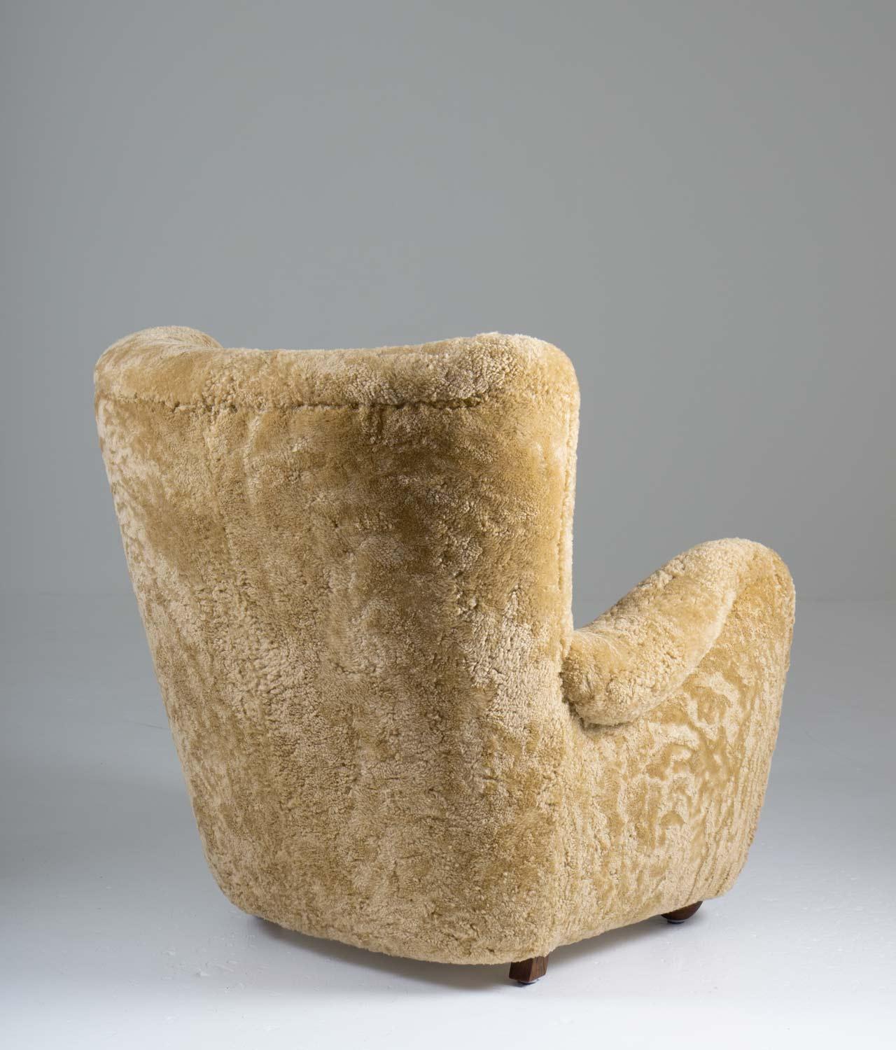 Danish Scandinavian Mid Century Lounge Chair in Sheepskin For Sale