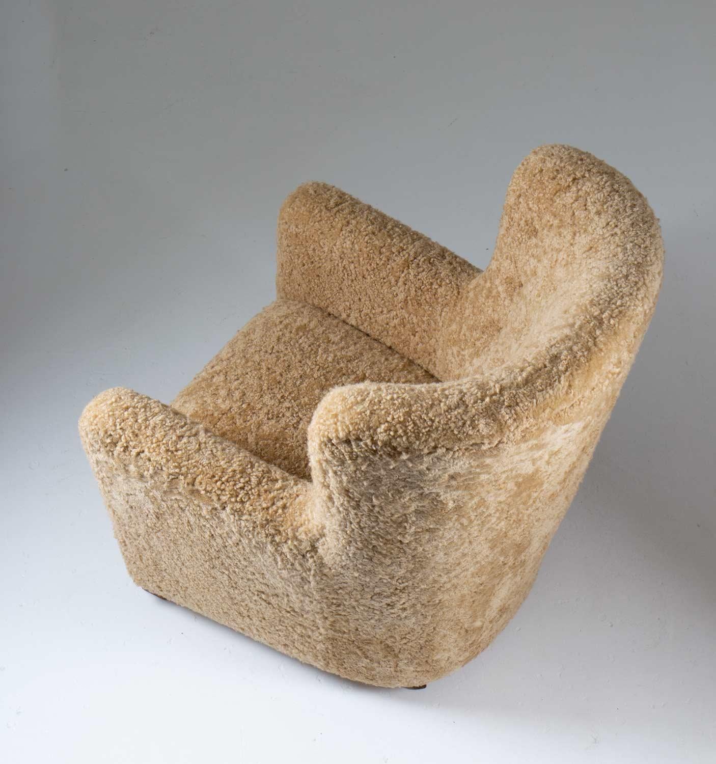20th Century Scandinavian Mid Century Lounge Chair in Sheepskin For Sale
