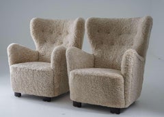 Scandinavian Midcentury Lounge Chairs in Sheepskin
