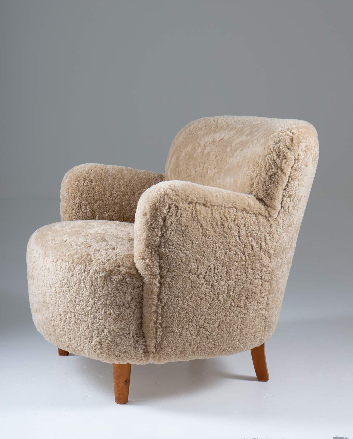 Swedish Scandinavian Mid Century Lounge Chairs in Sheepskin For Sale