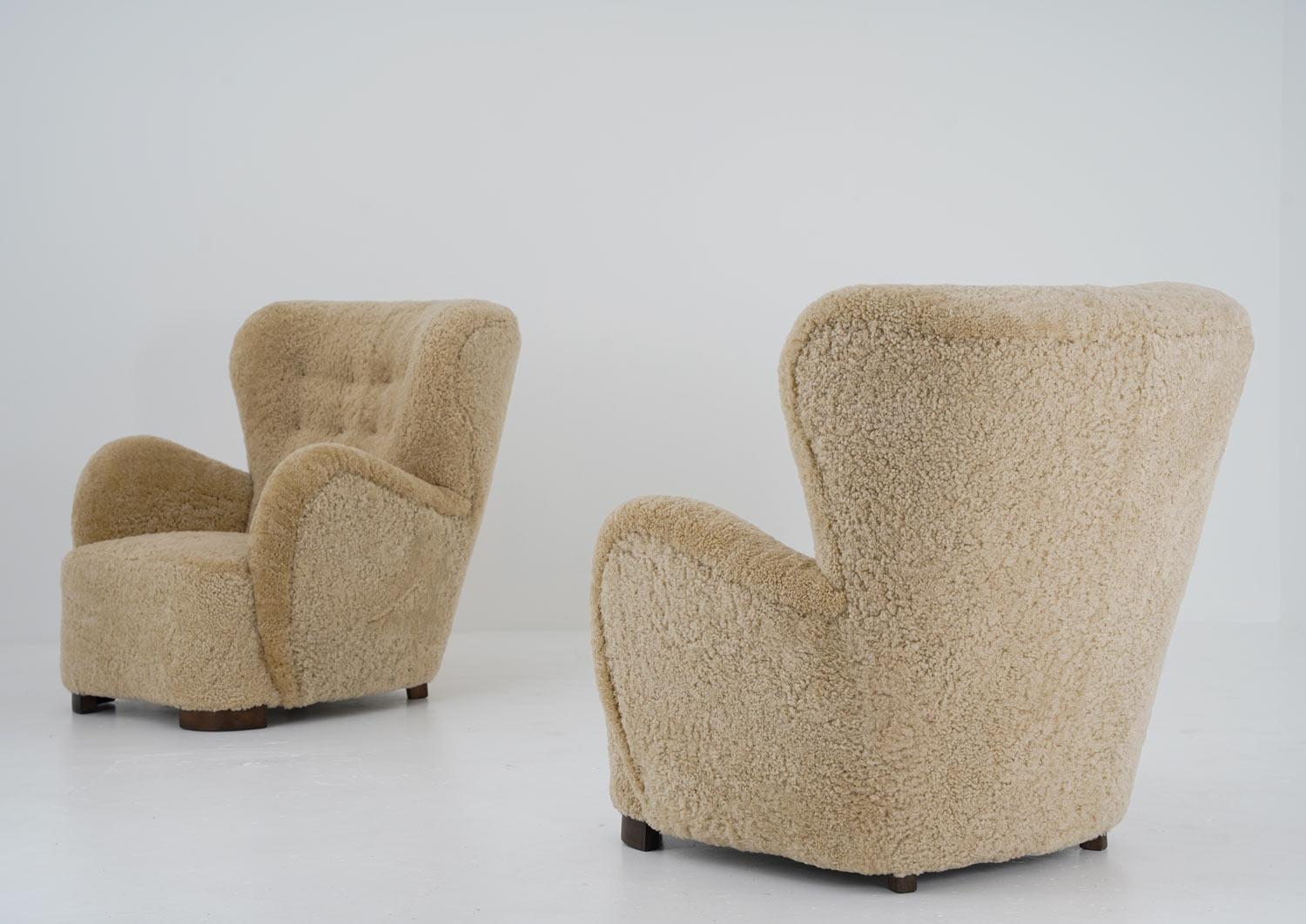 Scandinavian Mid Century Lounge Chairs in Sheepskin 1