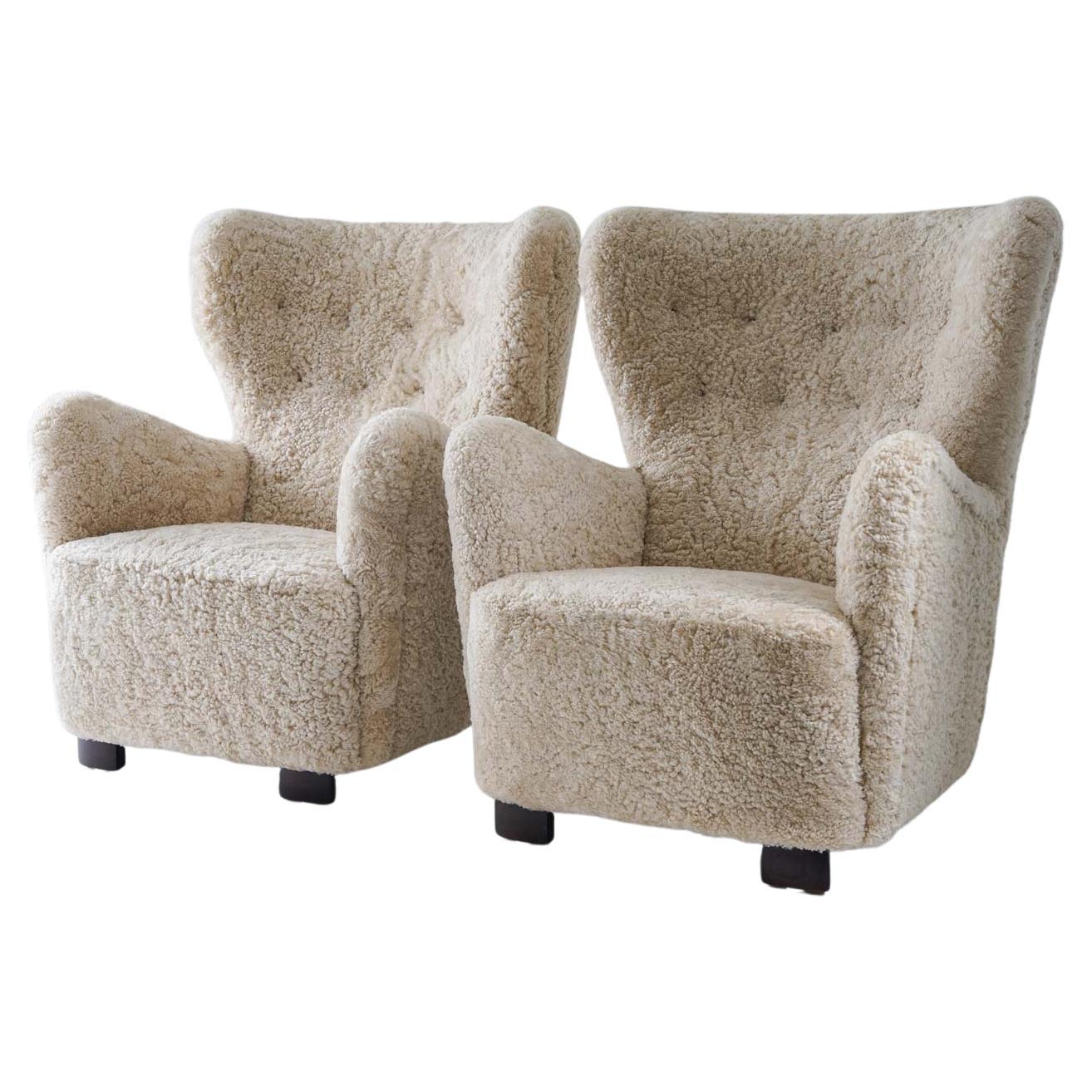 Scandinavian Midcentury Lounge Chairs in Sheepskin