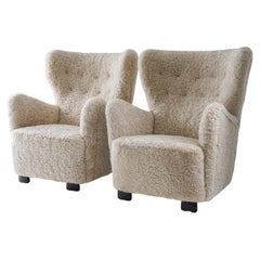 Scandinavian Midcentury Lounge Chairs in Sheepskin