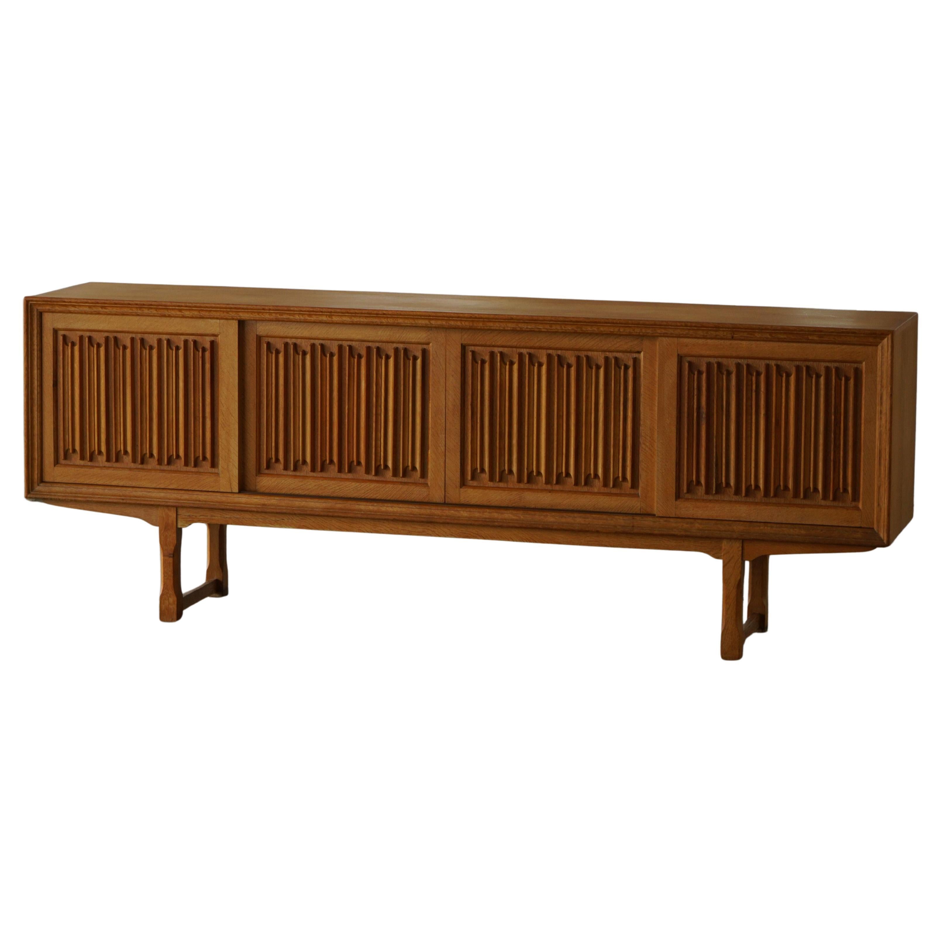 Scandinavian Mid Century Low Sideboard in Oak by a Danish Cabinetmaker, 1960s