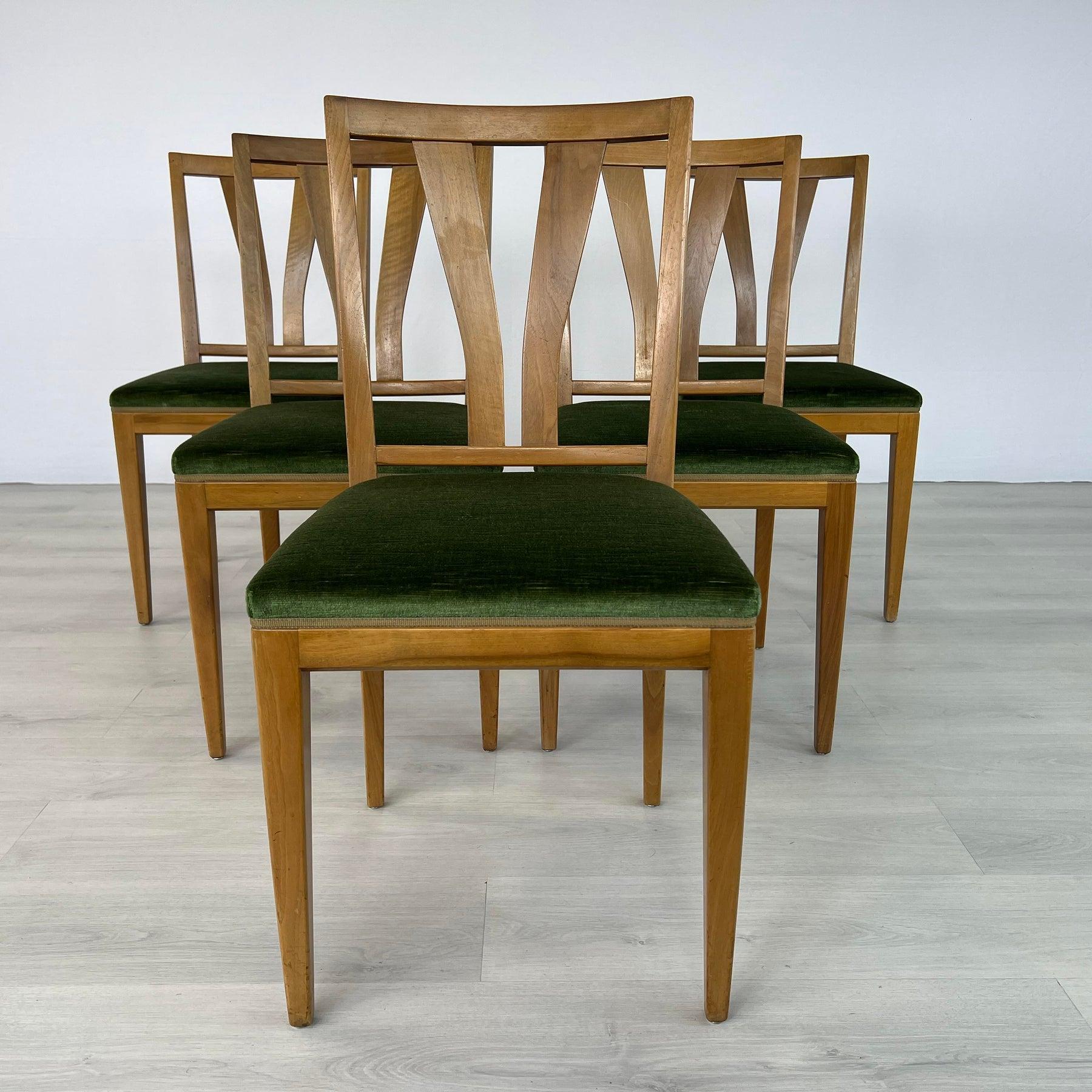 Dimensions: H 35” x W 17.5” x D 17.7” x SH 18.5”

Set of 5 Scandinavian Mid-Century Modern slat back dining chairs. Solid teak frames with seats upholstered in original green mohair. Simple, clean lines and compact design make these chairs perfect