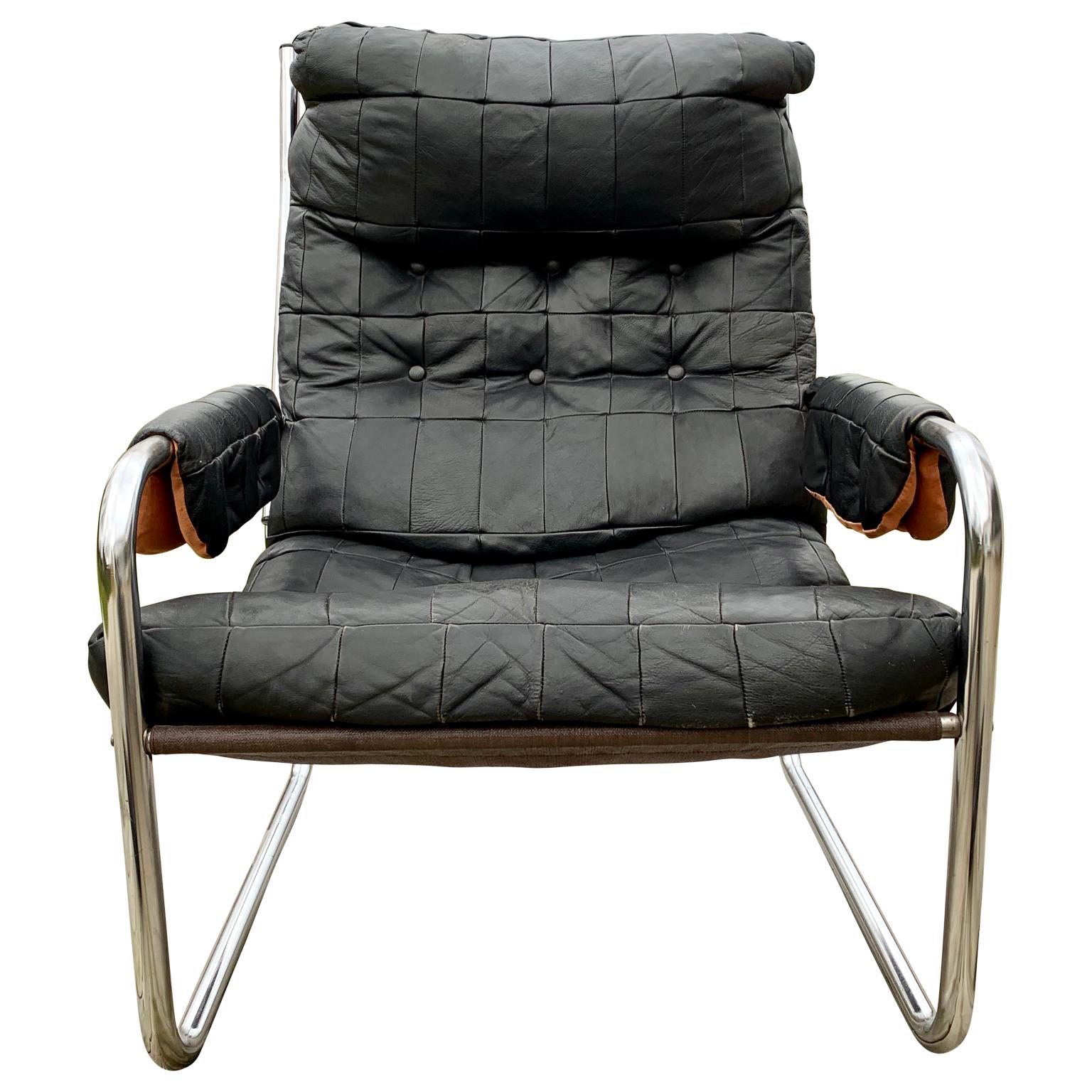Scandinavian Mid-Century Modern leather and chrome armchair, circa 1970s
 
Please note that this armchair is located in Halmstad, Sweden.
Complementary delivery to most areas of London UK, The Netherlands, Belgium, Denmark and Northern Germany.