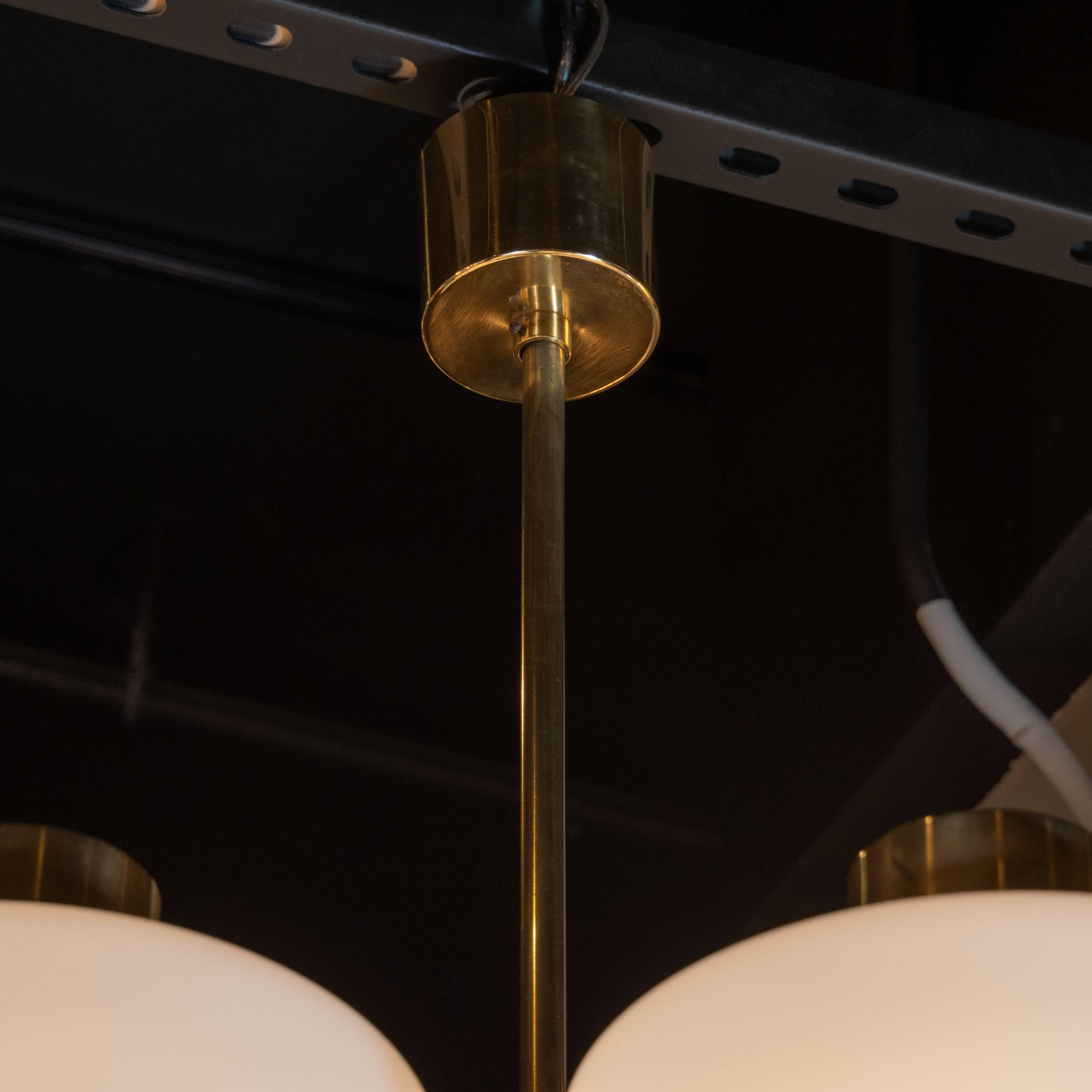 Scandinavian Mid-Century Modern Six-Arm Brass and Frosted White Glass Chandelier In Excellent Condition In New York, NY