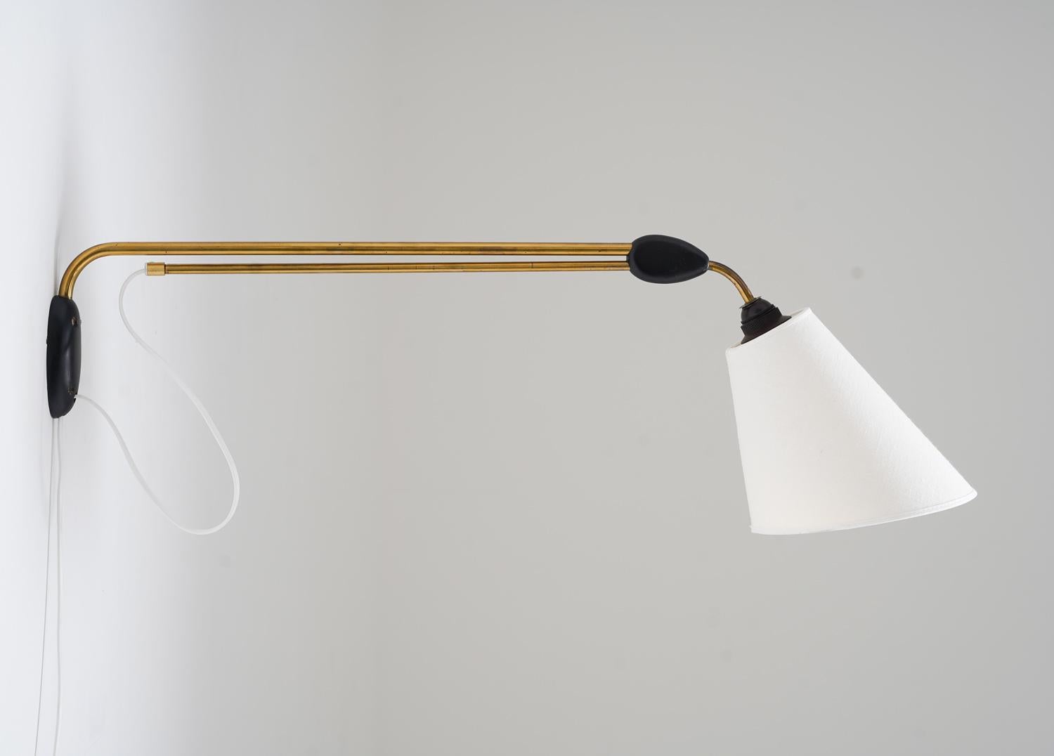 Scandinavian Modern Scandinavian Mid-Century Swivel Arm Wall Lamp by Pagos For Sale