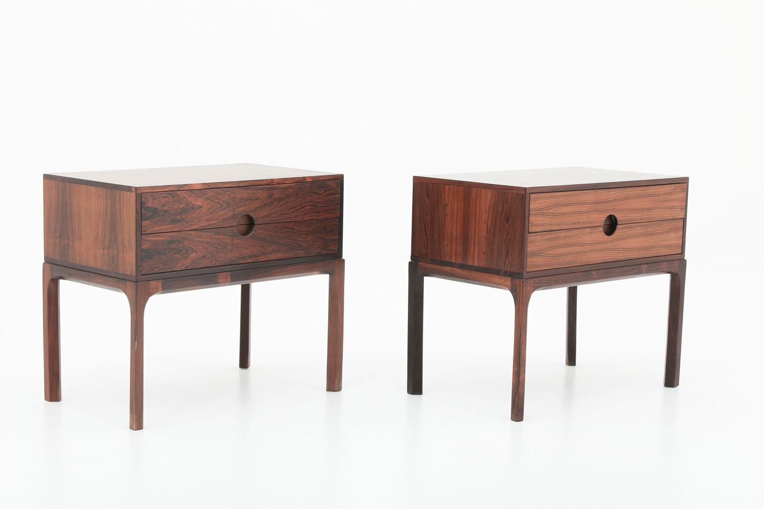 A pair of bedside tables in rosewood by Kai Kristiansen for Aksel Kjersgaard, Denmark, 1960s.
Beautiful bedside tables with great details, such as the round integrated handle on the drawers. 
Condition: Very good original condition. The drawers