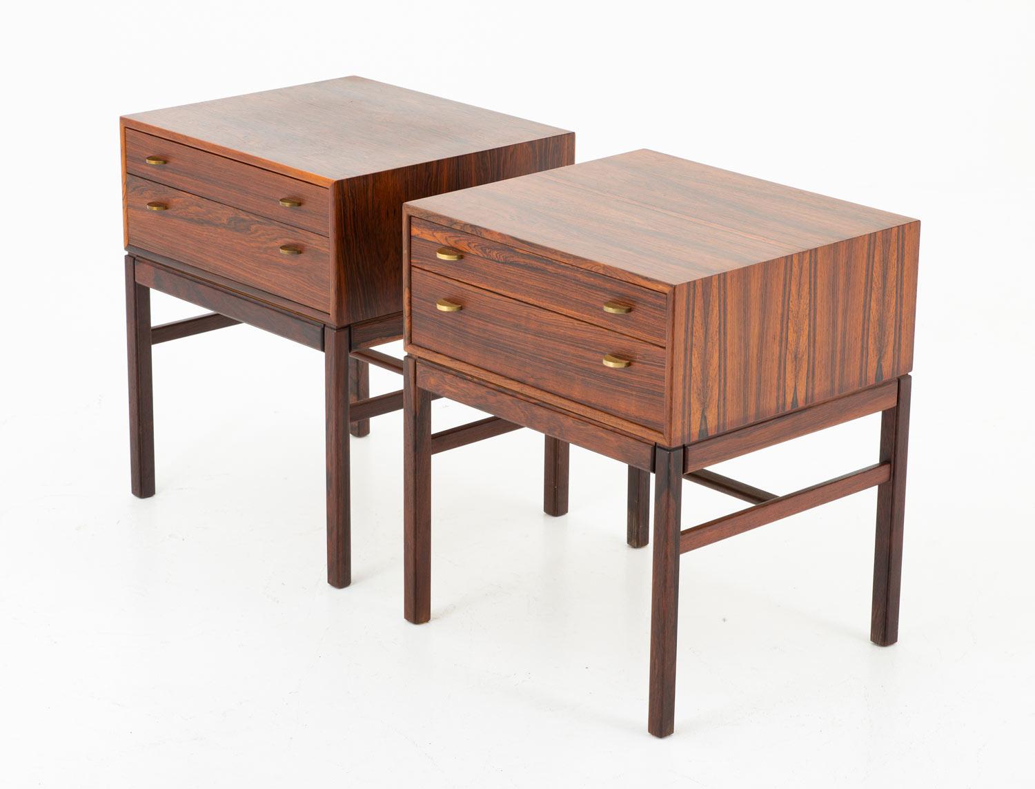 A pair of bedside tables in rosewood with brass details, model Casino by Gunnar Myrstrand and Sven Engström for Tingströms, Sweden, 1960s. 
This was not originally a pair and they differ slightly. One of the tables has one big drawer instead of two