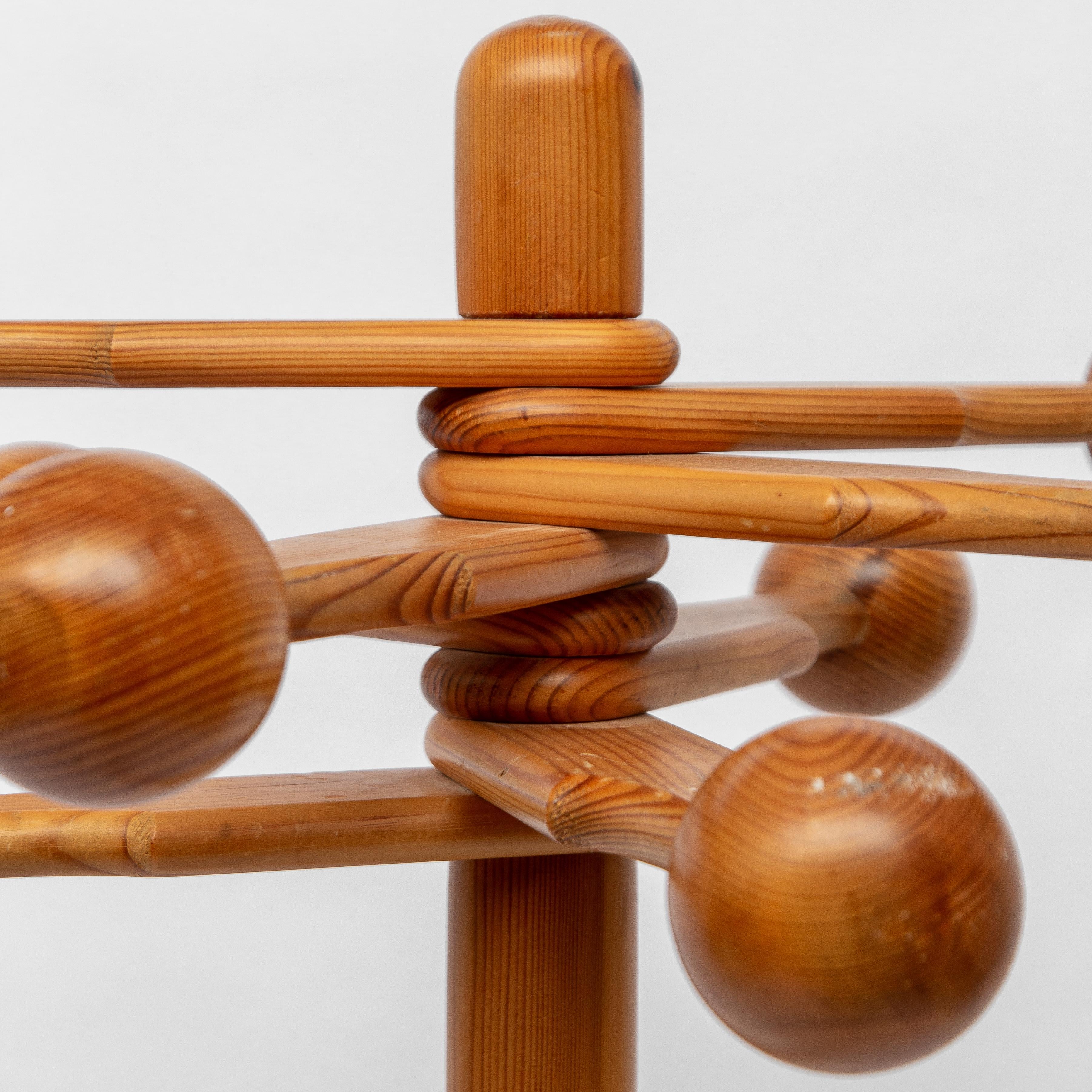 Scandinavian midcentury coat rack in pine, Produced in Sweden in the 1970s. Can be dissembled. Eight adjustable arms.