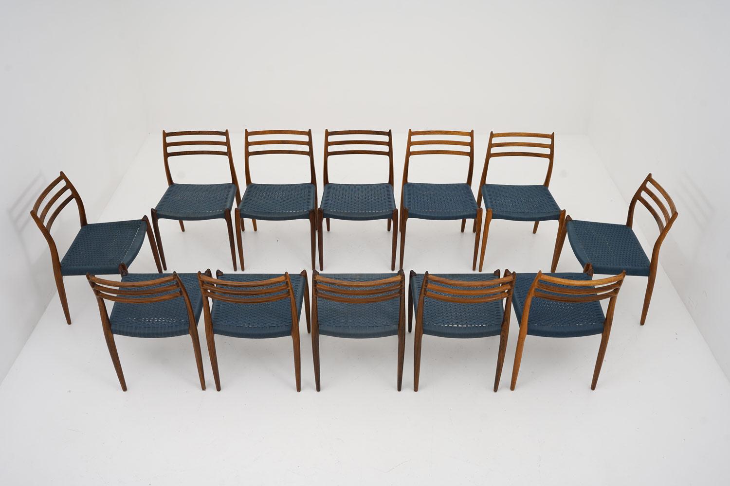Rare set of 12 Scandinavian midcentury dining chairs model 78 by Niels Otto Møller, Denmark.
These sculptural rosewood chairs are constructed with an impressive sense for quality and design. 

Condition: The wood is in very good original condition,