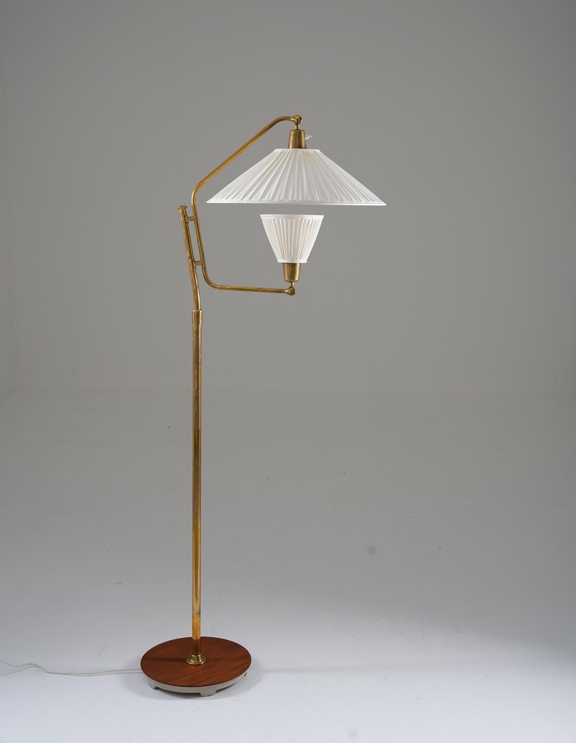 Scandinavian midcentury floor lamp by Bertil Brisborg for NK, Sweden.
This rare model is made for Nordiska Kompaniets 