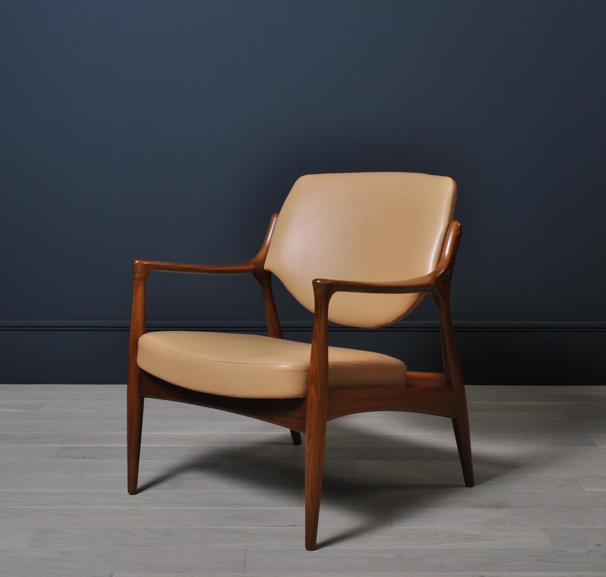 Teak framed Scandinavian midcentury lounge chair with all new leather upholstery. Swedish origin. Extremely comfortable and perfect for reading etc.