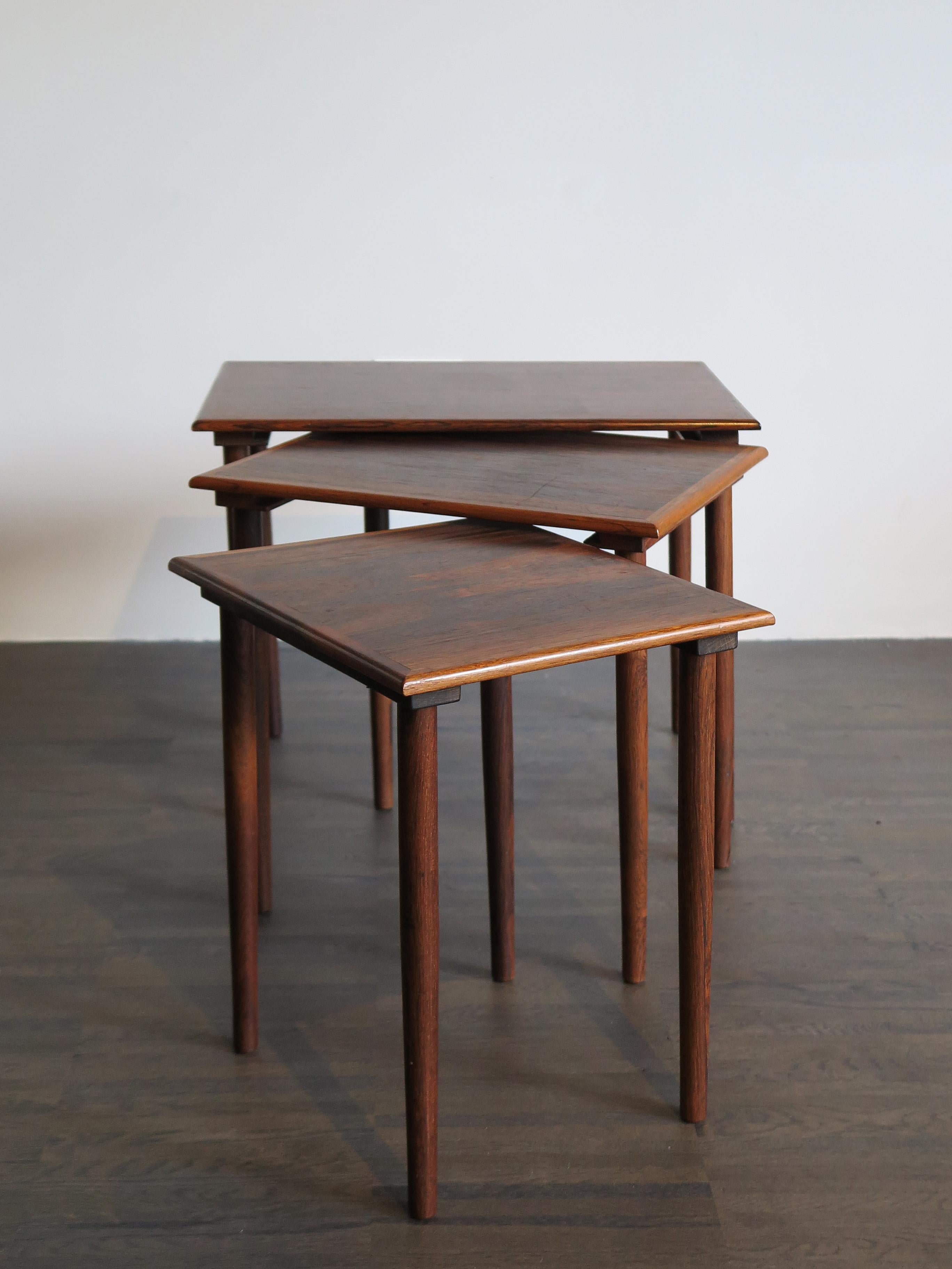 Danish dark wood nesting tables set, circa 1950s,
please note that the set is original of the period and thus shows normal signs of age and use.
