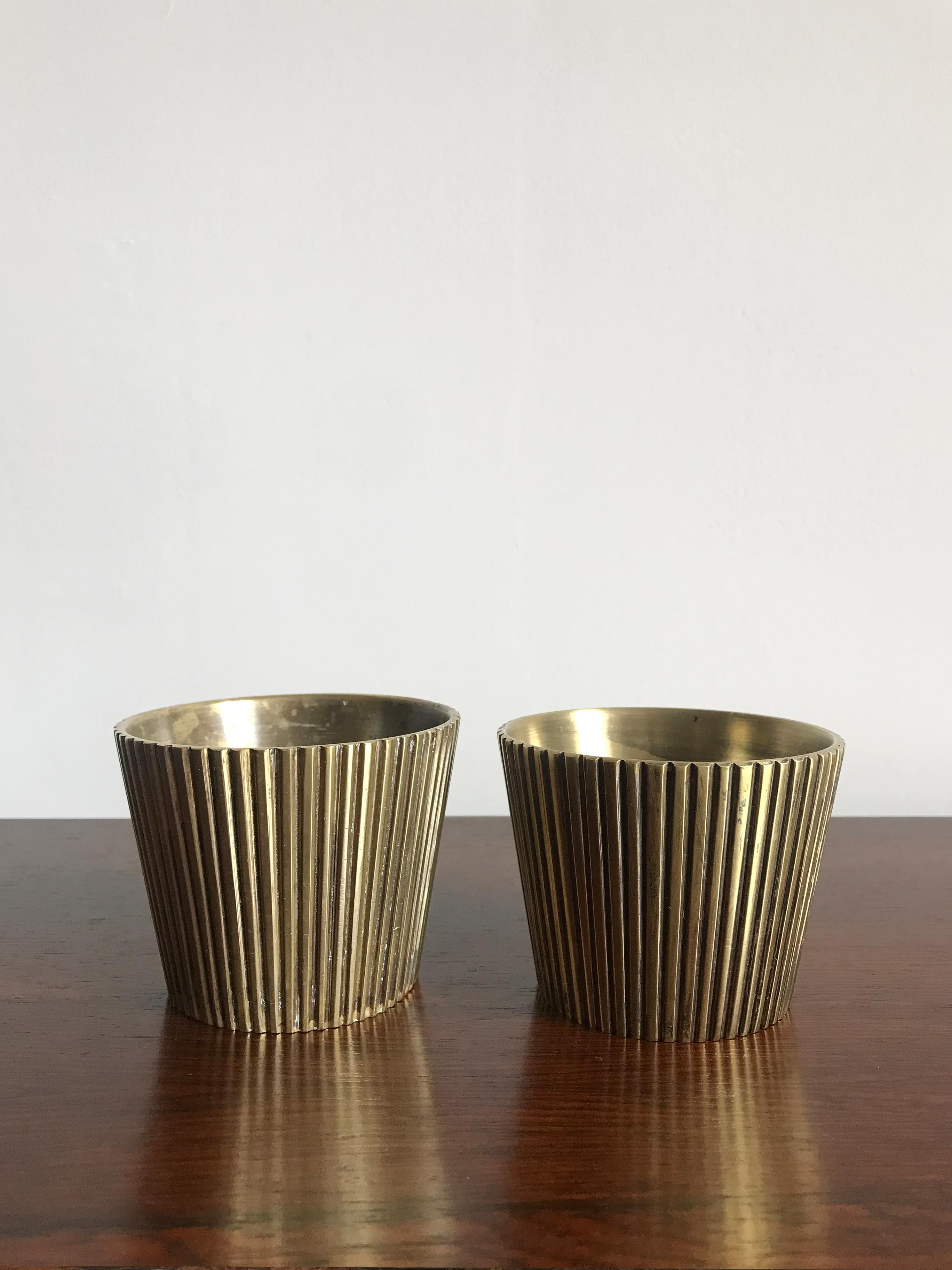 Scandinavian midcentury modern design vases set in solid brass produed in Denmark, circa 1950s.
Please note that the items are original of the period and this shows normal signs of age and use.