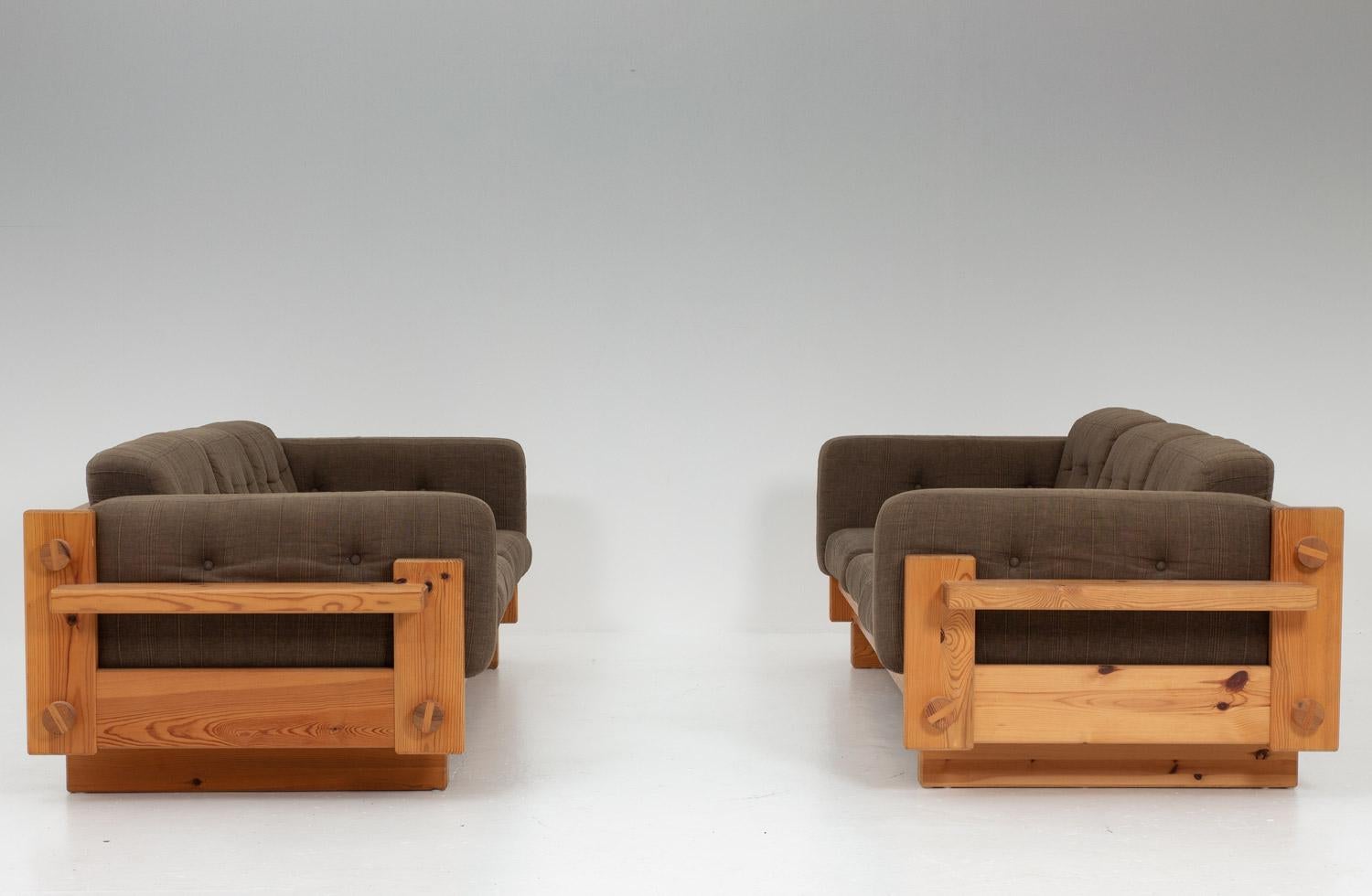 Pair of rare three-seat sofas model 