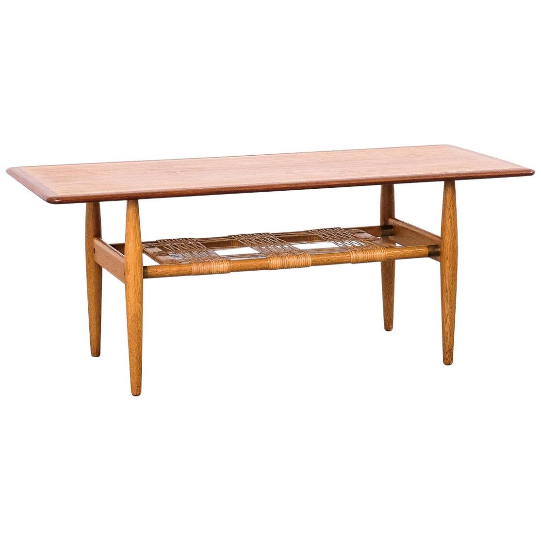 Scandinavian Midcentury Teak and Oak Coffee Table with Woven Cane Shelf