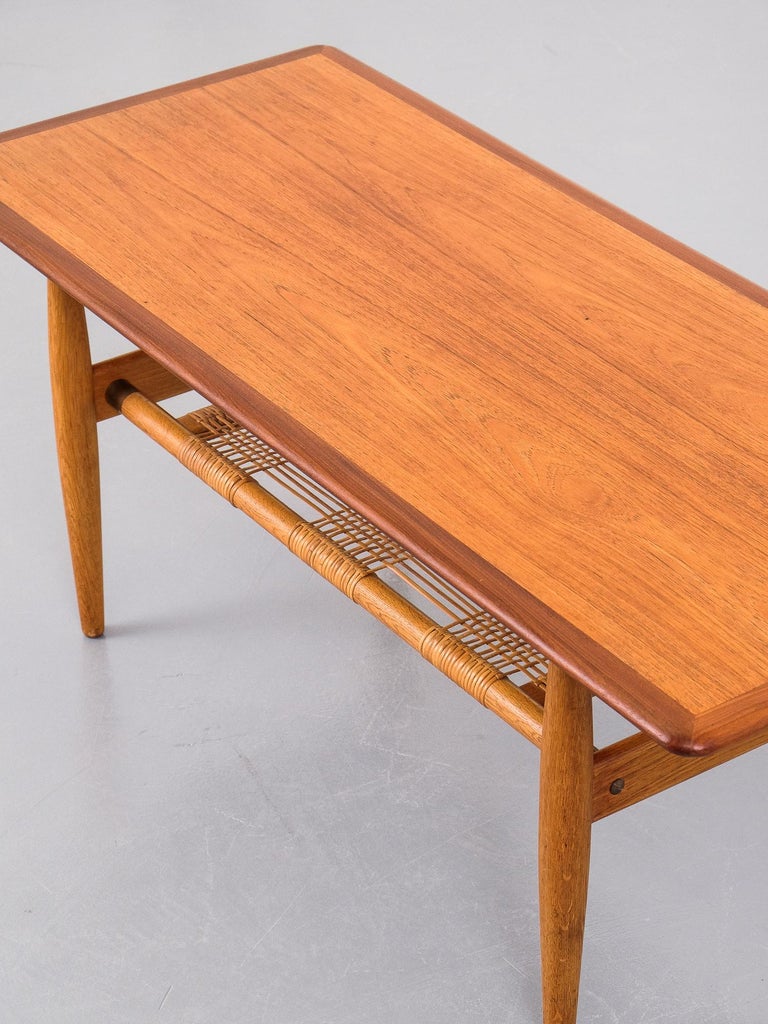 Scandinavian Midcentury Teak and Oak Coffee Table with Woven Cane Shelf