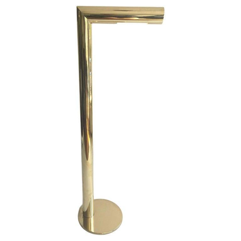 Minimalist brass floor lamp designed by Jonas Hilde for Hovik Lys AS, Norway, circa 1980. They create downwards lighting in a fixed position, ideal for reading and atmospheric light
The lamp is a remarkable example of Norwegian post modernist