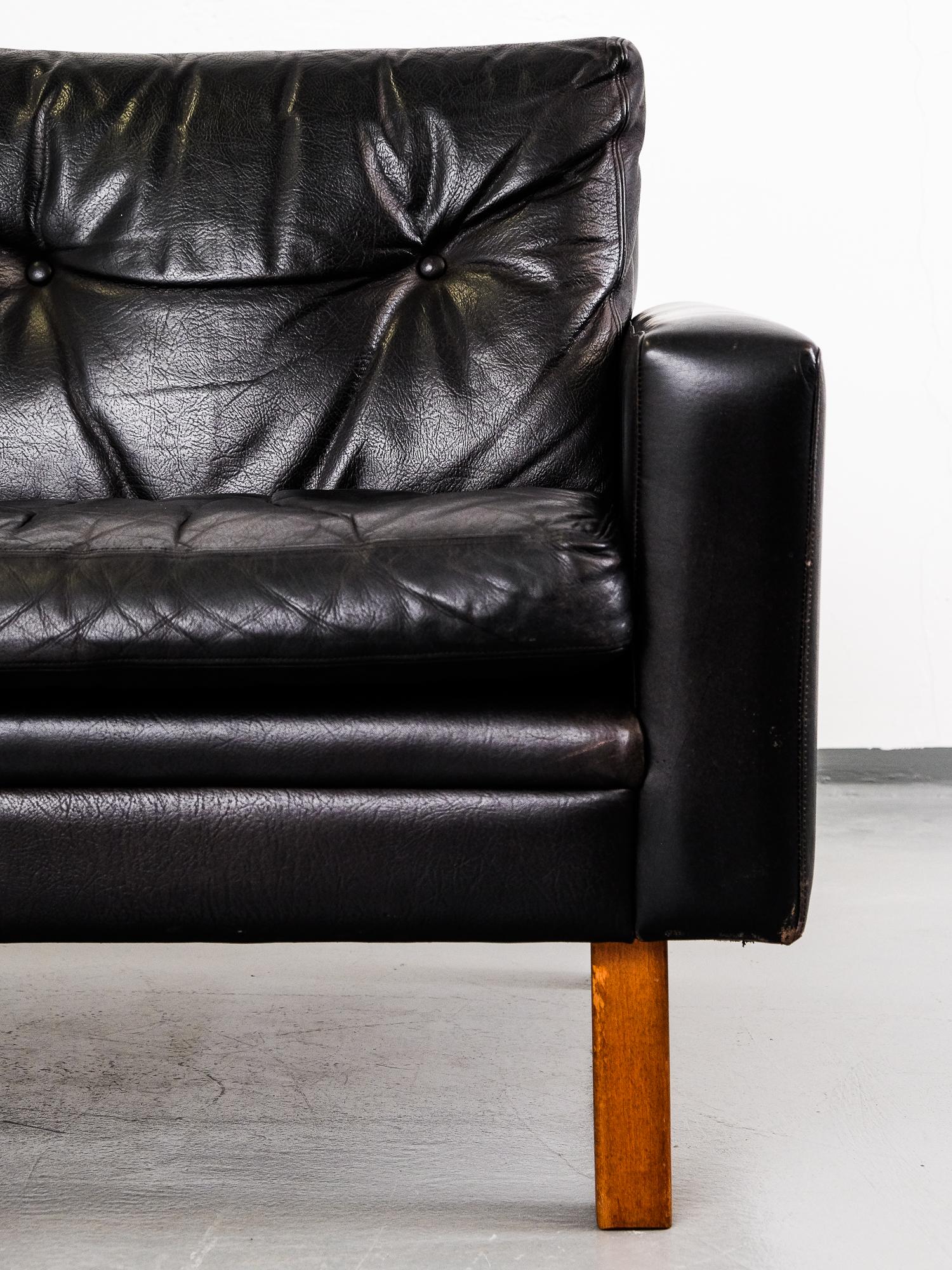 Mid-Century Modern Scandinavian Modern 1960s Black Leather Three-Seat Sofa with Teak Legs