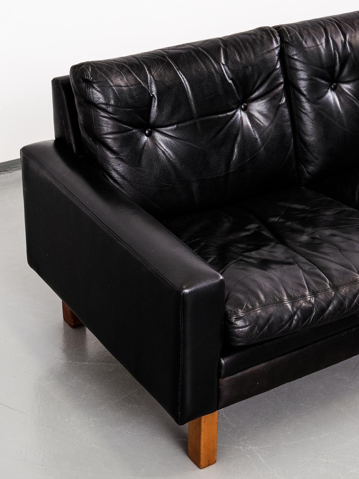 Scandinavian Modern 1960s Black Leather Three-Seat Sofa with Teak Legs In Good Condition In Helsinki, FI