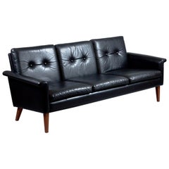 Scandinavian Modern 1960s Black Leather Three-Seat Sofa with Teak Legs Scandinavian Modern 1960s Black Leather Three-Seat Sofa with Teak Legs