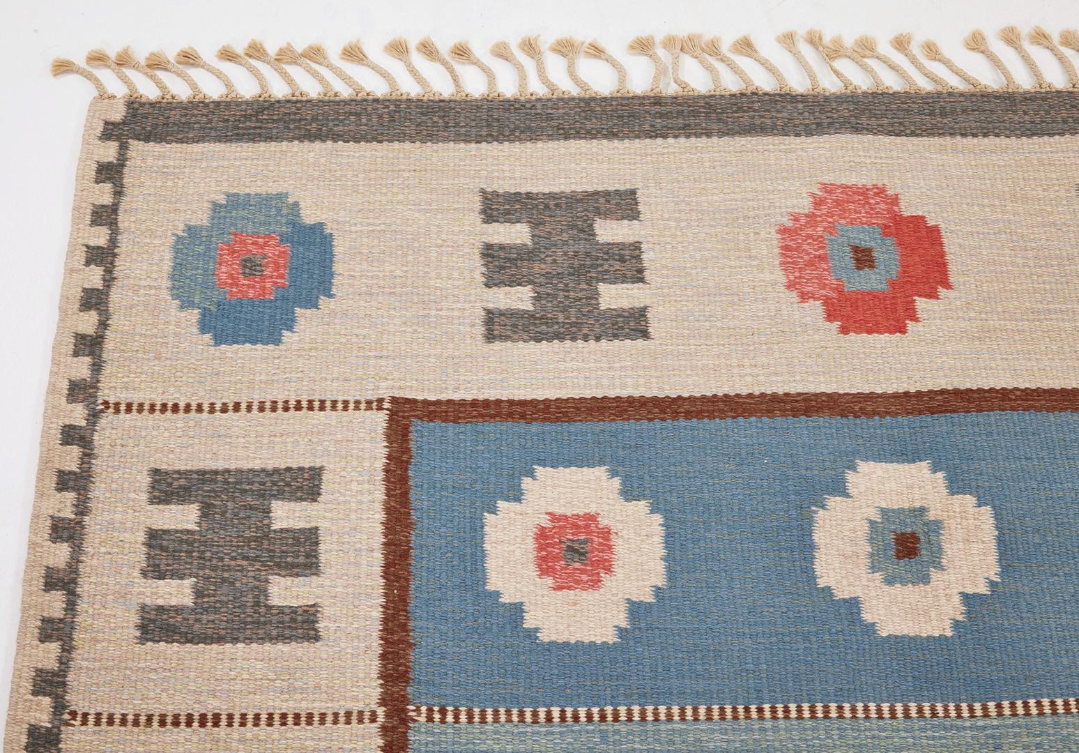 A vintage Swedish flat-weave wool rug by Alice Walleback dating back to 1960s with woven initials (AW) at a lower corner. Size: 6.5