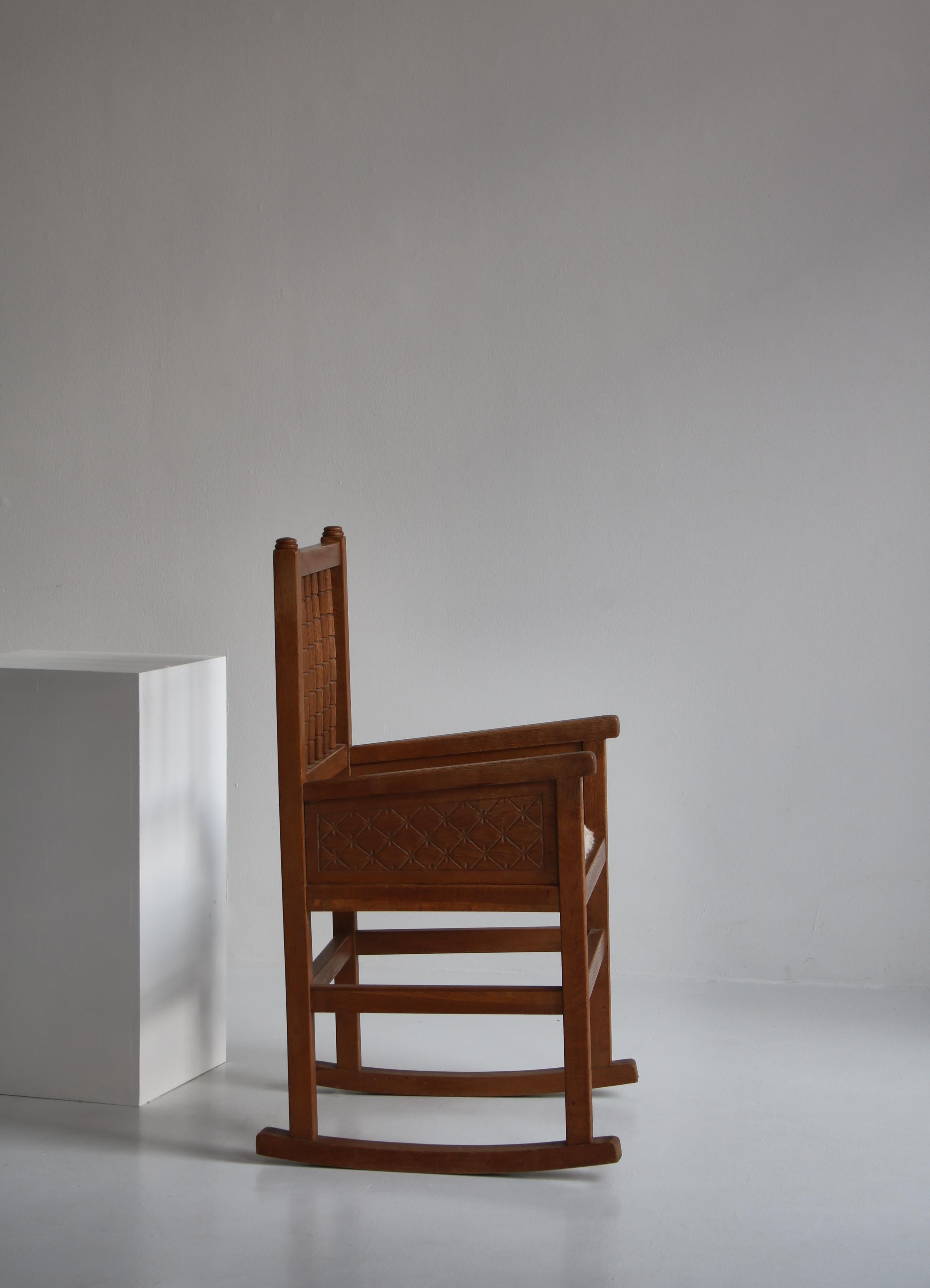 Cabinetmakers Carved Rocking Armchair in Sheepskin and Oak, Denmark, 1930 For Sale 2