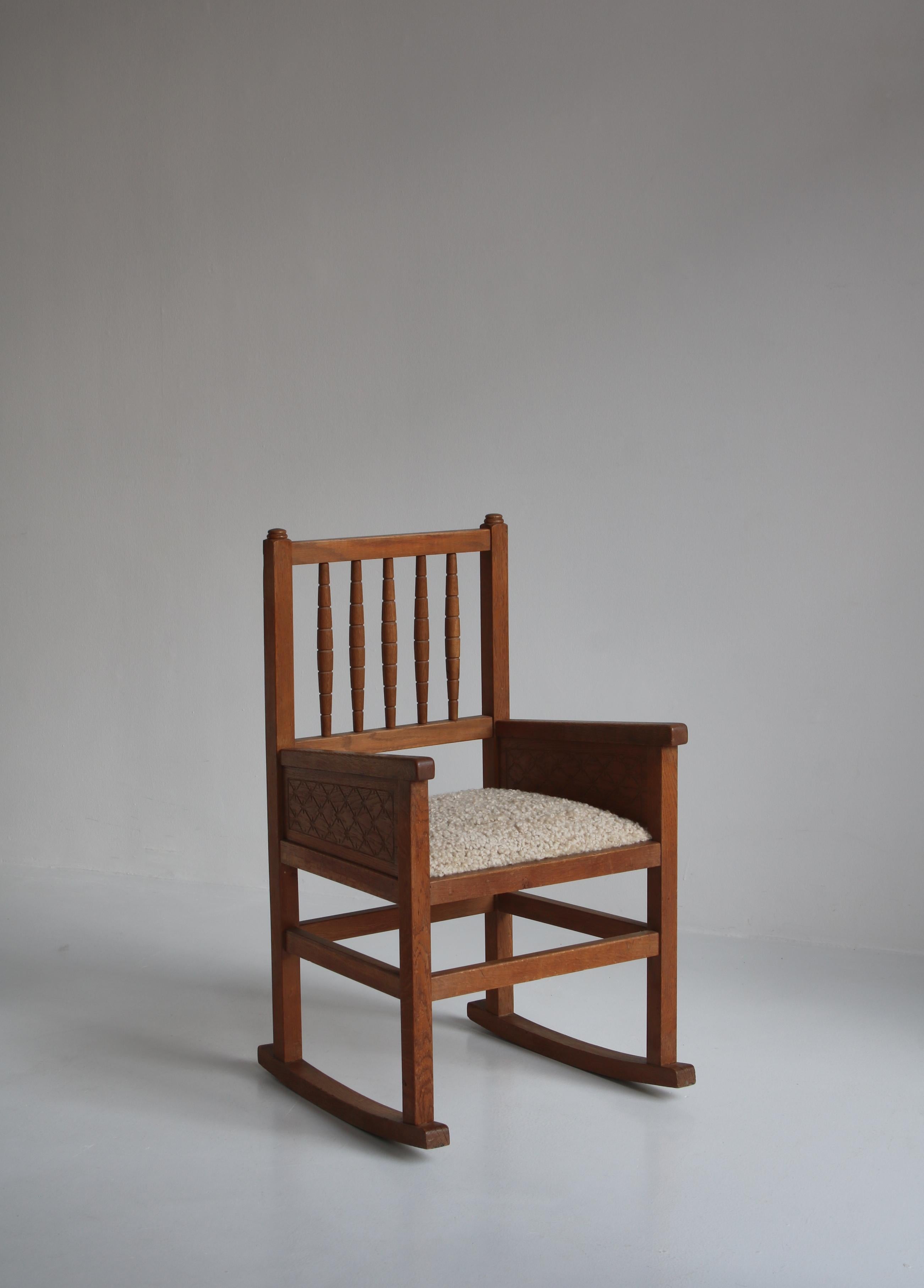 Cabinetmakers Carved Rocking Armchair in Sheepskin and Oak, Denmark, 1930 For Sale 3