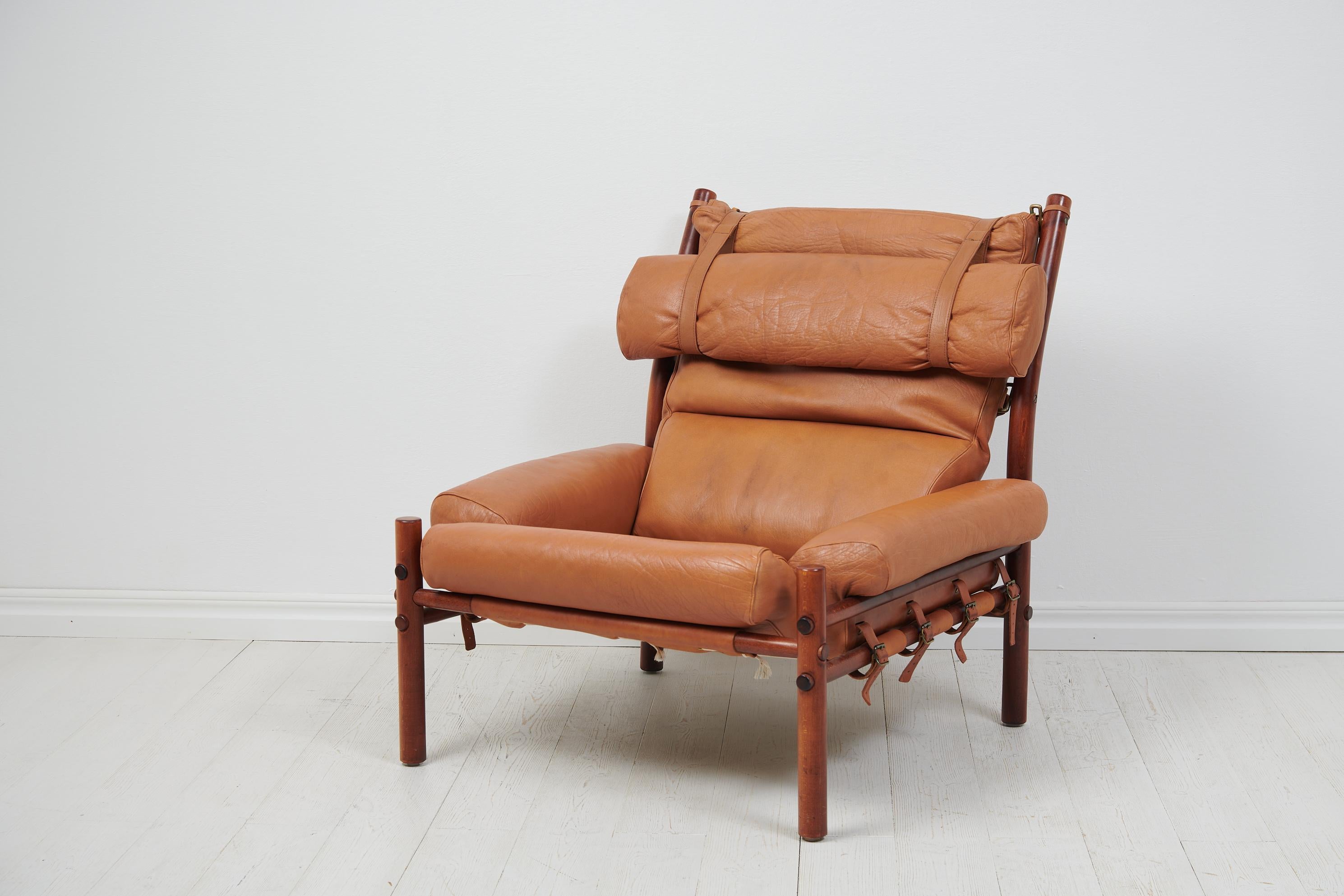 Leather lounge chair Inca by Arne Norell designed in 1971. This Scandinavian modern armchair has upholstery in buffalo leather and frame made from birch. The chair is manufactured by Norell Möbler during the 1970s. The frame is held together with