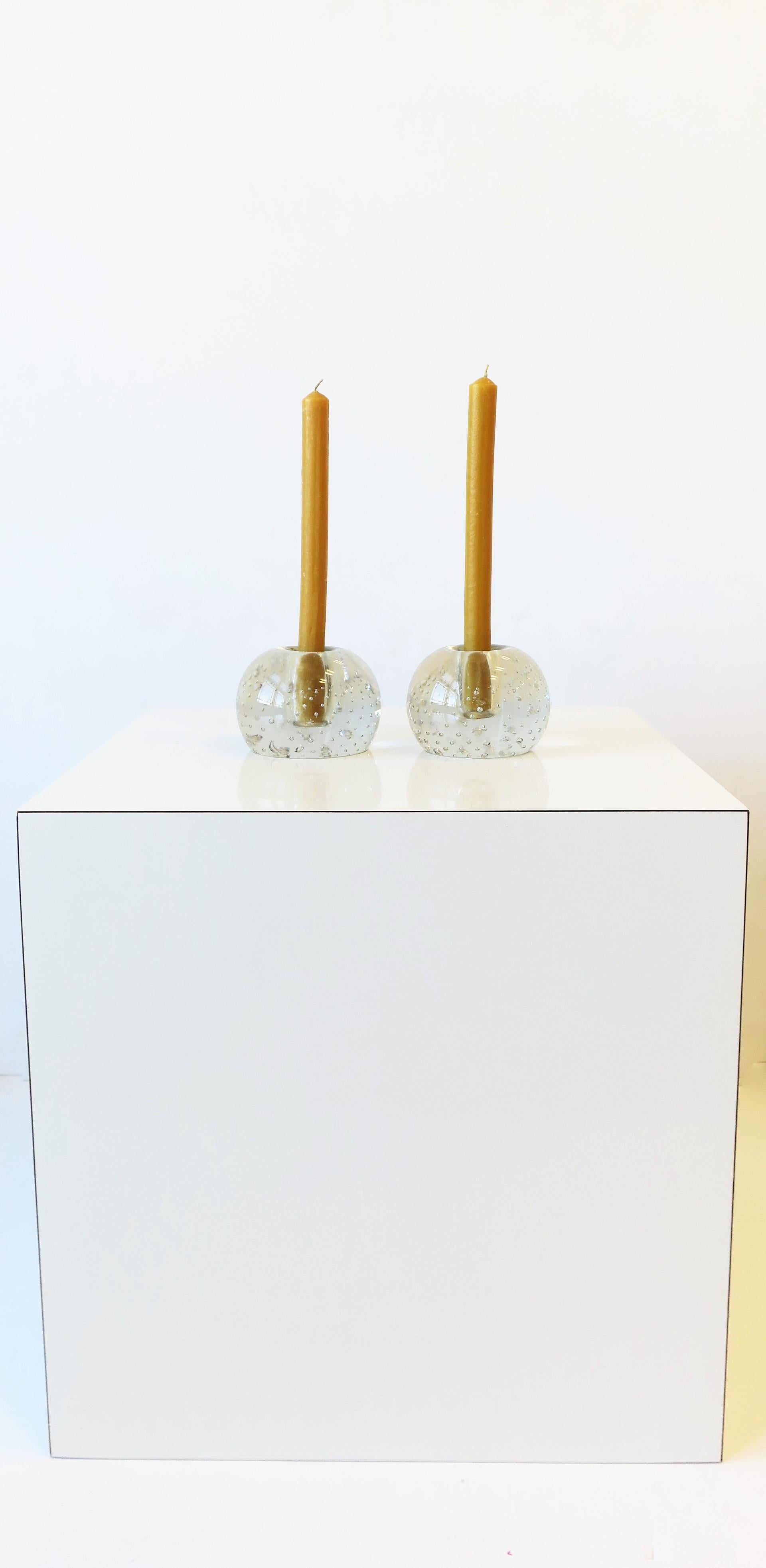 A beautiful and substantial pair of Scandinavian Modern art glass candlestick holders with a controlled bubble design, circa 1960s, Scandinavia. 

White end table shown also available, search 1stDibs ref. #: LU1314222935752
Egyptian Revival