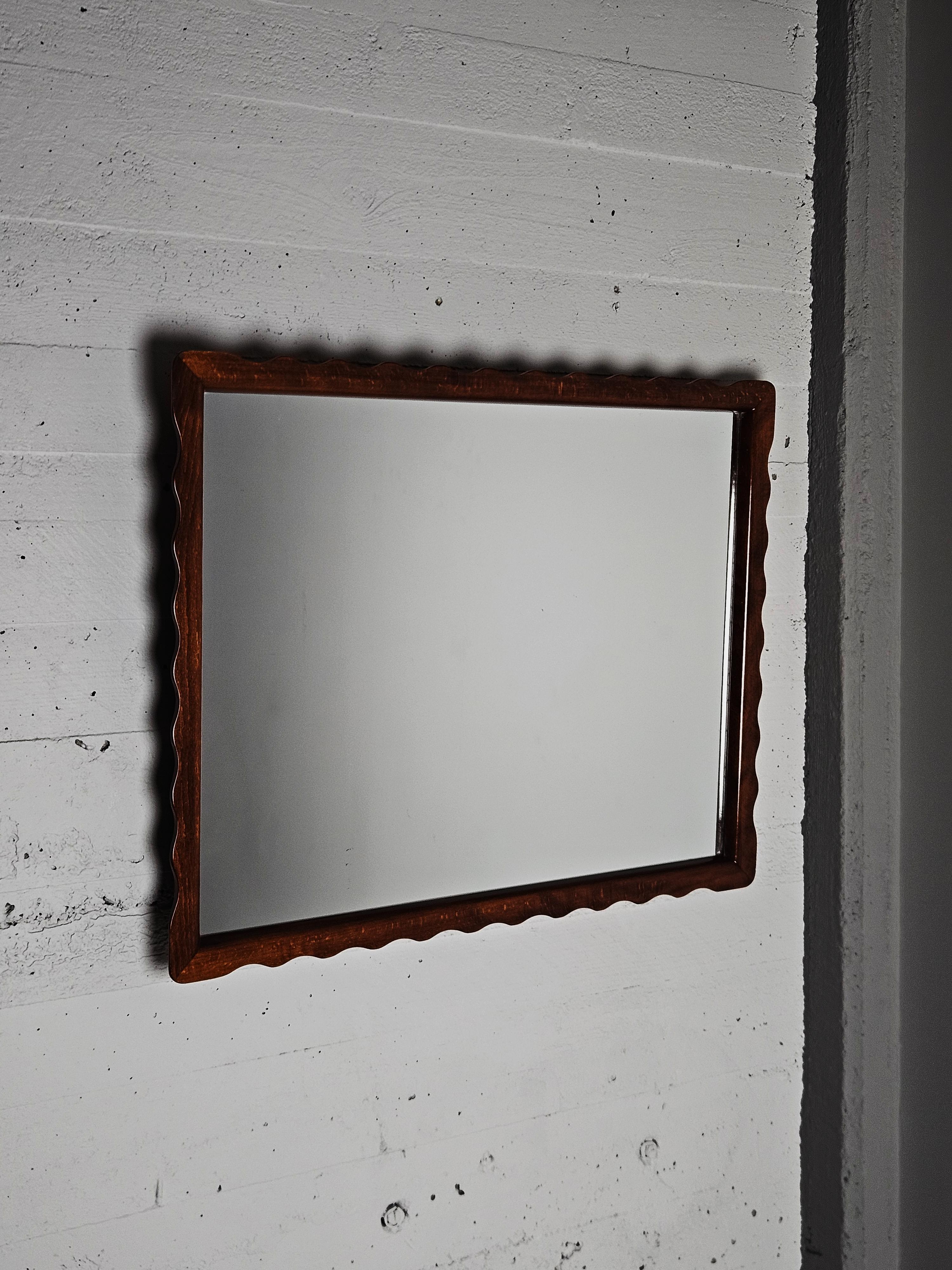 Rare anonymous wall mirror. Made in Sweden during the 1940s. 

Beautiful craftmanship. 

Made in beech. Good size.