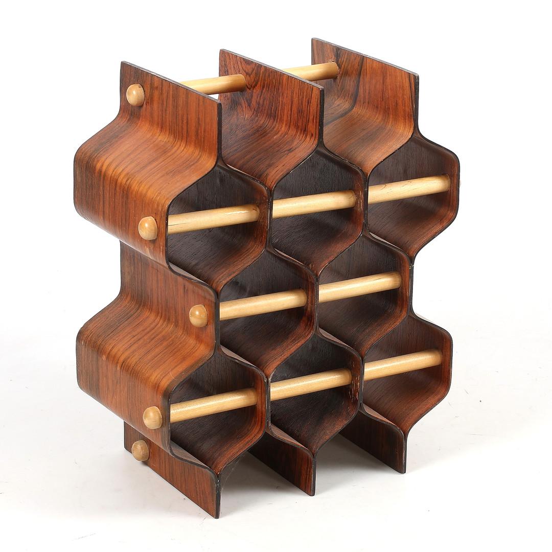 Wine rack inspired by a beehive designed by Torsten Johansson. Produced by AB Formträ in Sweden.