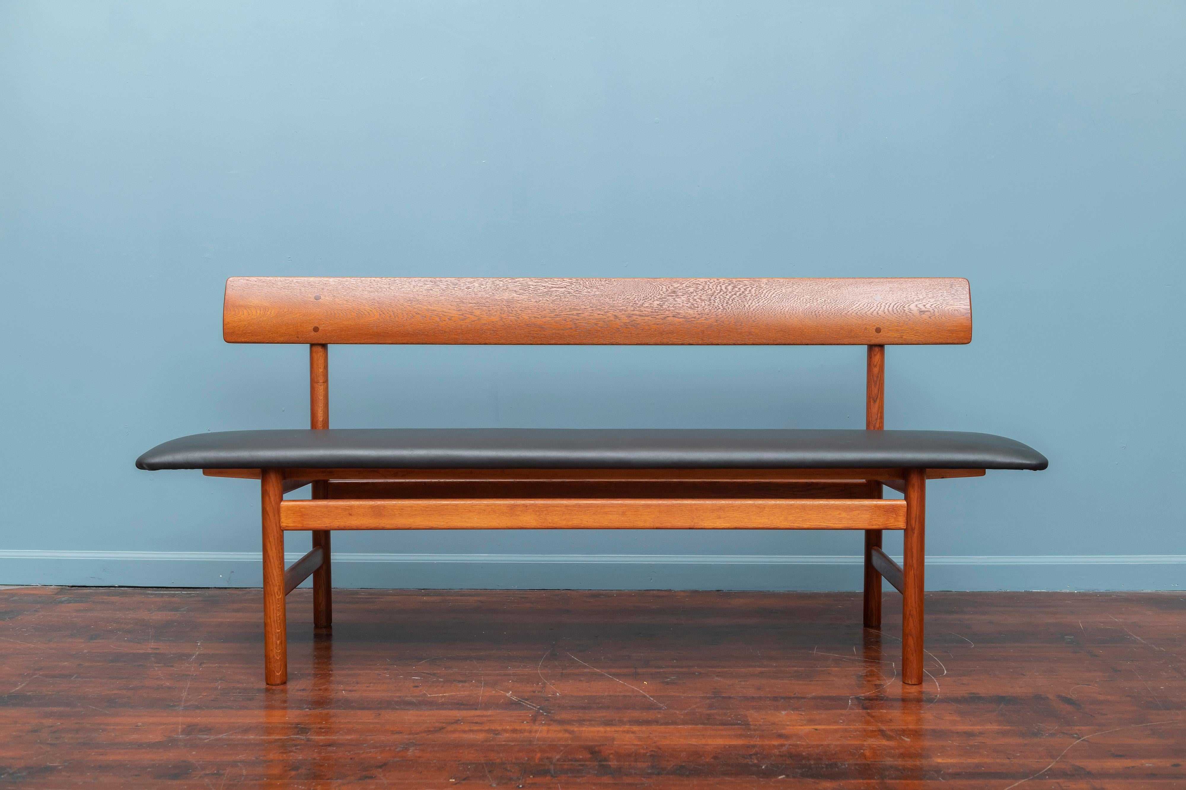Scandinavian modern teak and leather bench designed by Borge Mogensen for Federica, Denmark. Newly refinished and upholstered, stamped.