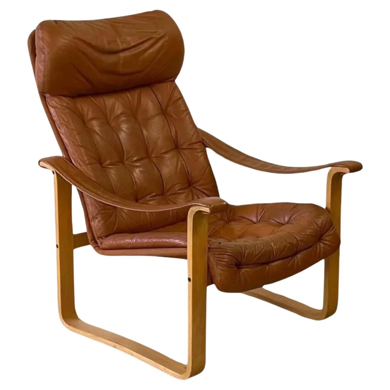 Scandinavian modern Blonde bentwood Leather lounge chair by Bjarne Dahlqvist