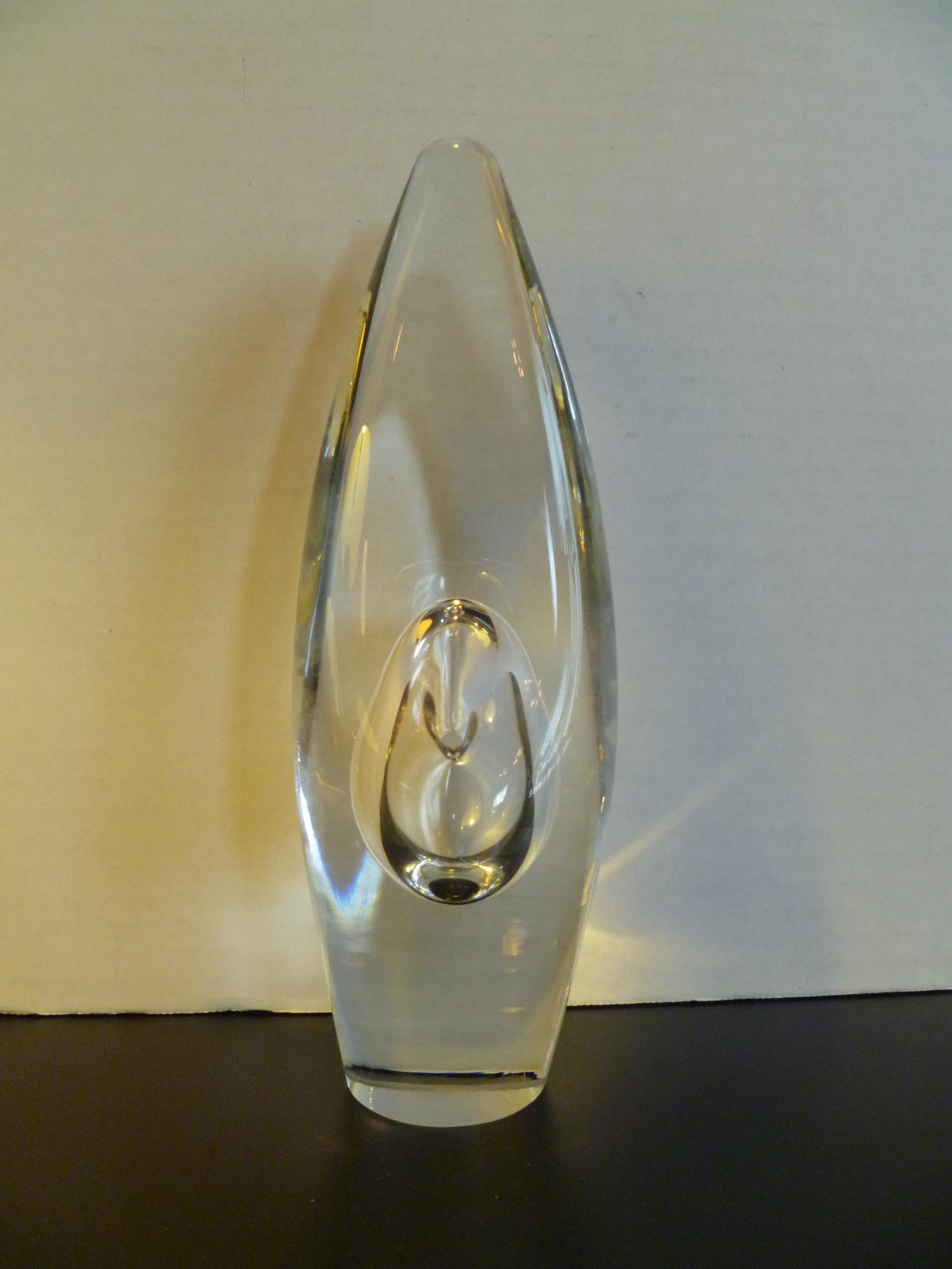 REDUCED FROM $790....From Finnish master glassmaker Timo Sarpaneva 1926-2006, a 1987 production of the iconic orchid sculptural bud vase in blown lead crystal. Designed in 1953 in clear crystal is meant for a single bloom whose stem would come to
