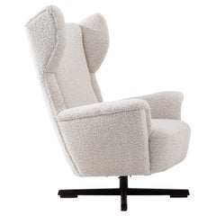 Fauteuil scandinave moderne tapissé de tissu bouclé