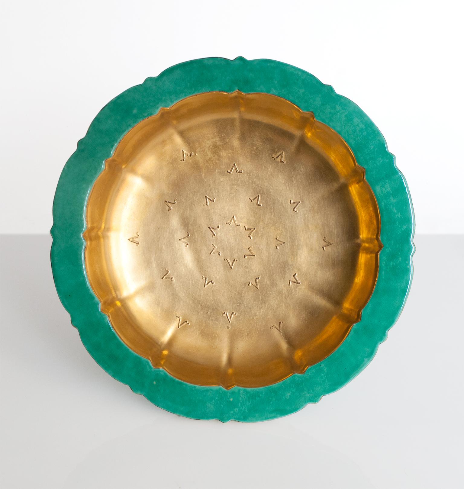 Large Scandinavian Modern ceramic bowl glazed in gold and green glazes. Designed by Wilhelm Kage for Gustavsberg, circa 1920s. Measure: Height 3