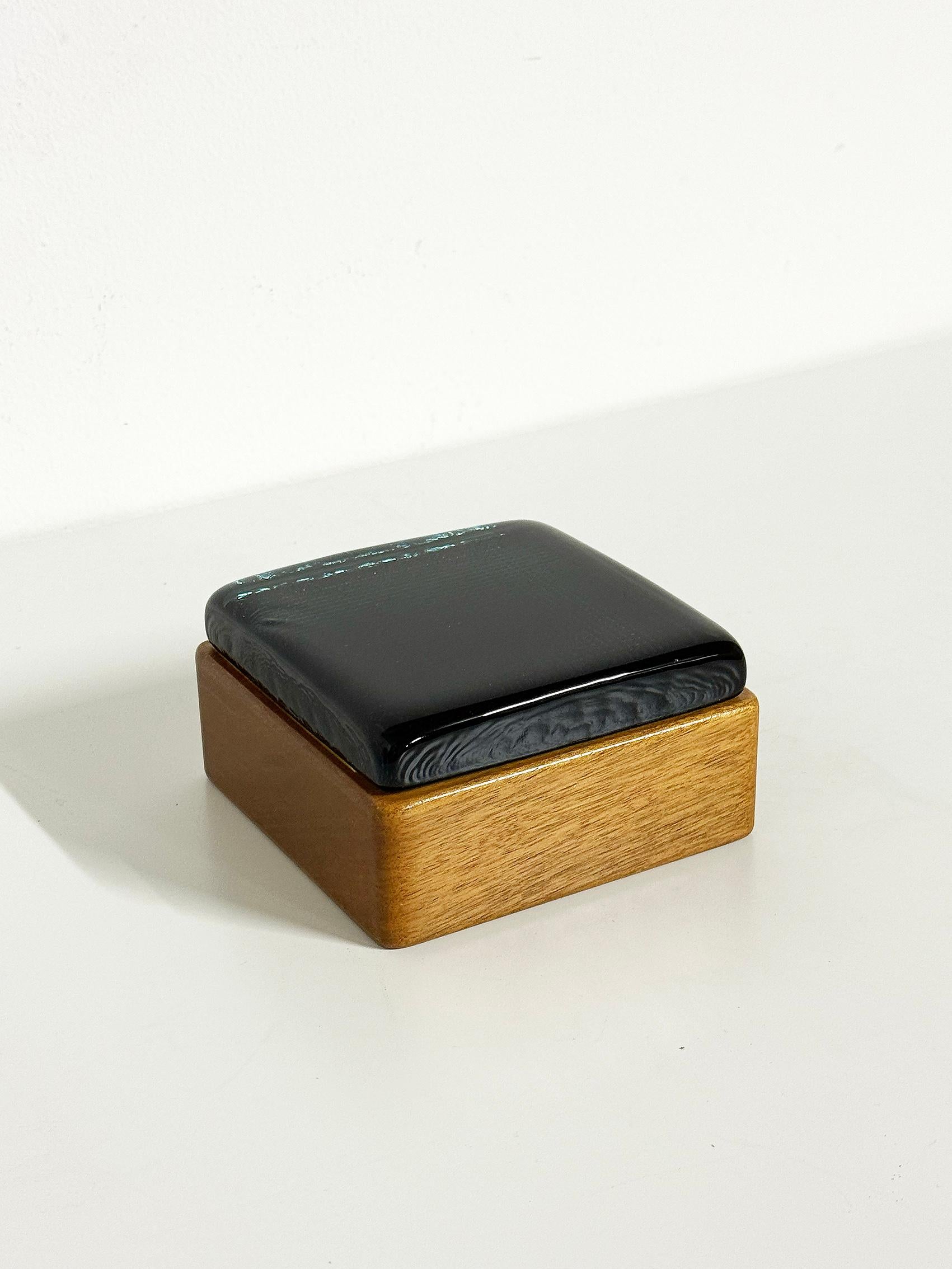 Scandinavian Modern box in teak and glass, attributed to Bengt Edenfalk, Skruf, ca 1960's. 
Made for a company named Ekman & Co AB.
Good vintage condition, wear and patina consistent with age and use. 
Scratches and marks. 