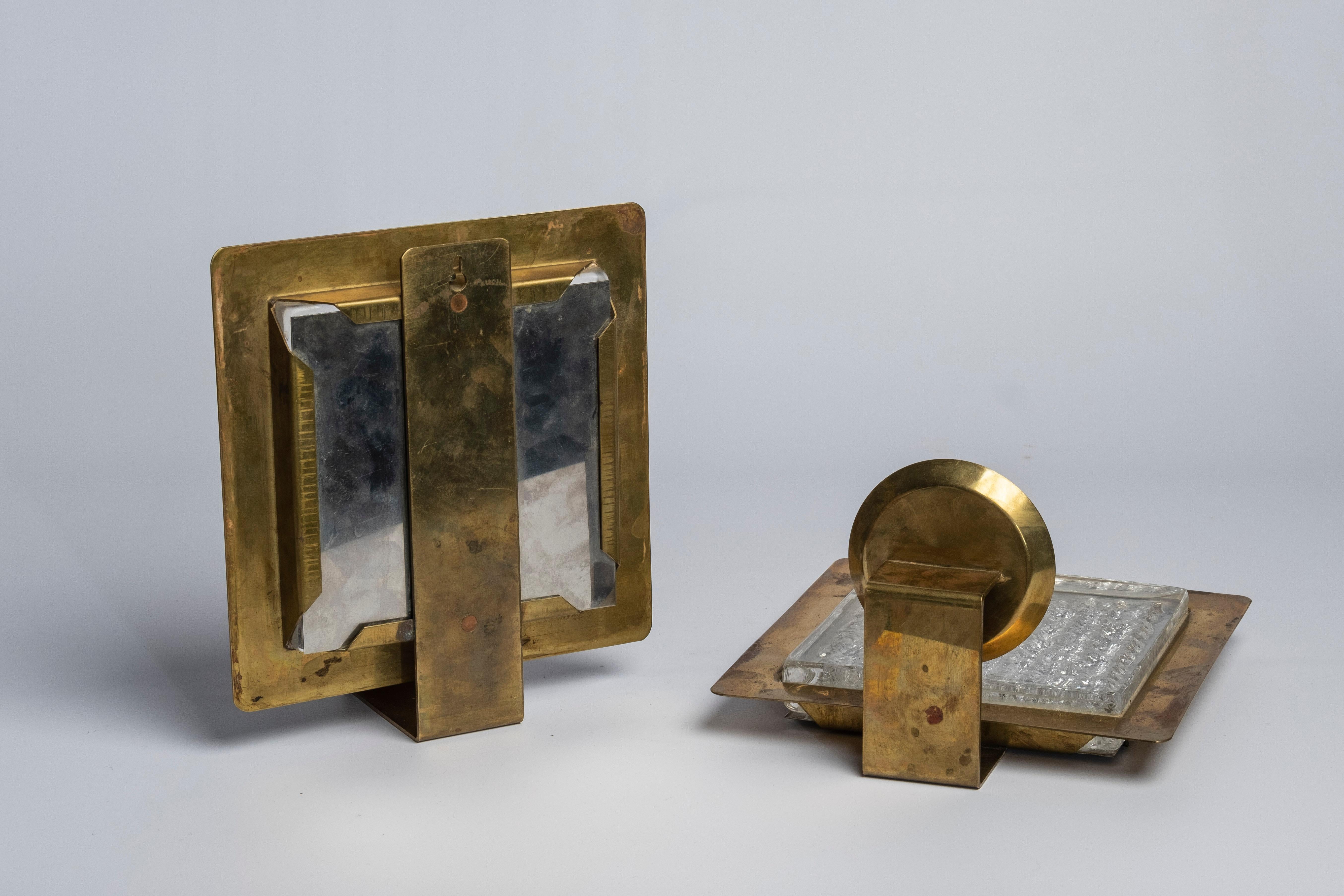 Pair of brass and glass wall-mounted candle light holders fabricated by Høvik Lys, Norway 1950s. Beautifully patinated brass.