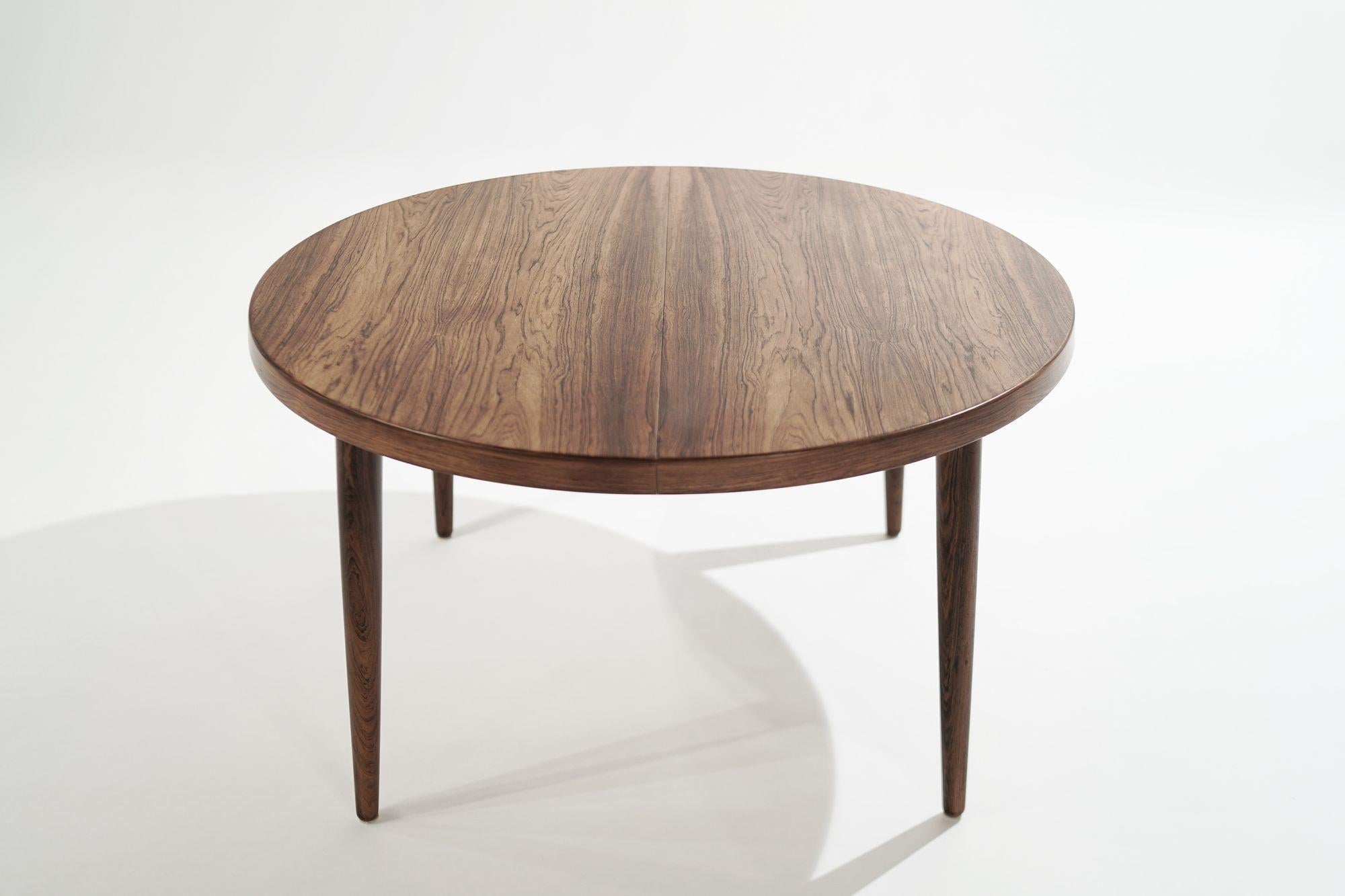 A beautiful Scandinavian-Modern breakfast or dining table original from Denmark, designed by Harry Østergaard, circa 1960-1969.
Perfect scale for a 
