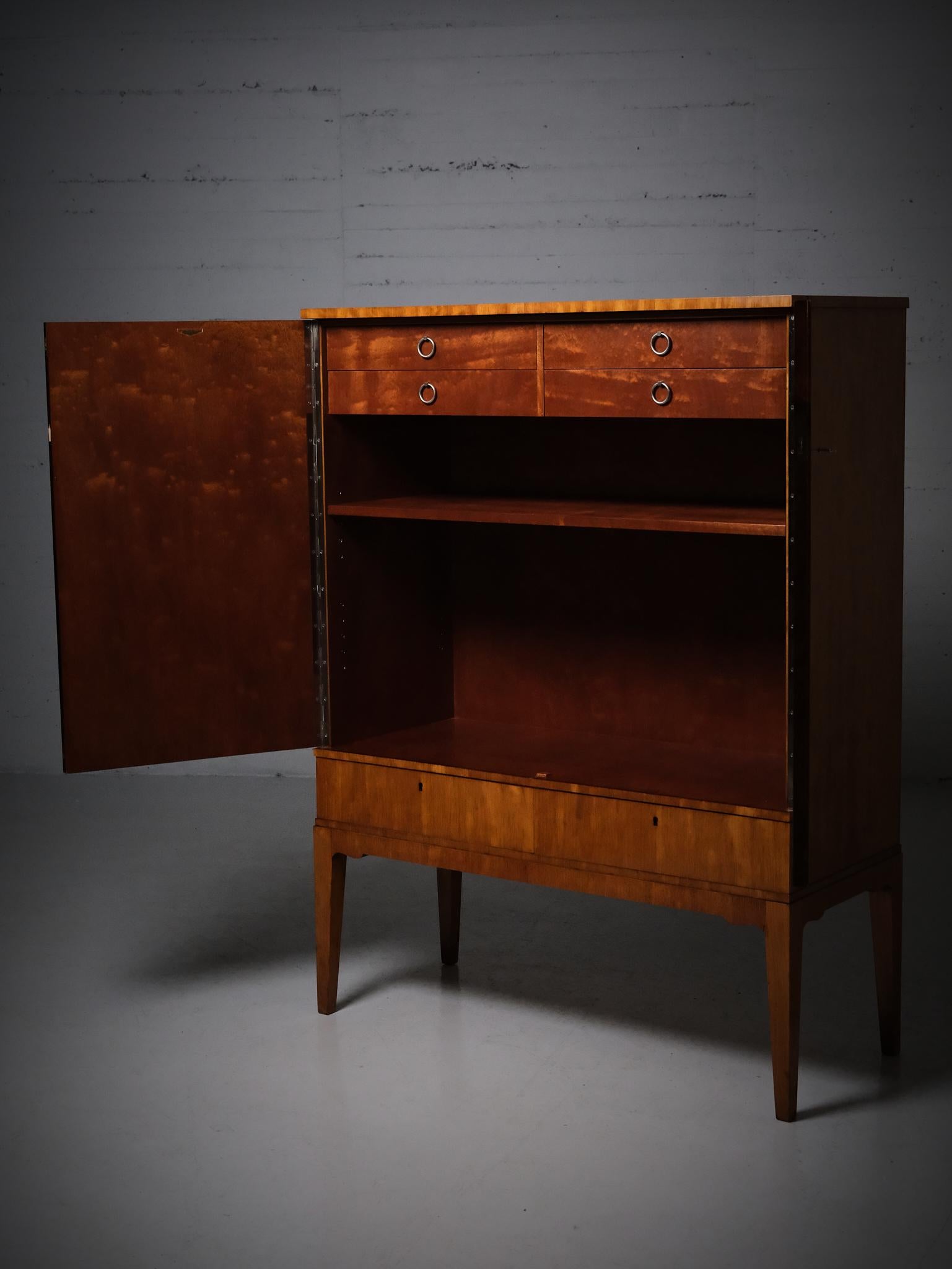 Mahogany Scandinavian modern cabinet by Möbelbolaget Tranås, Sweden, 1940s For Sale
