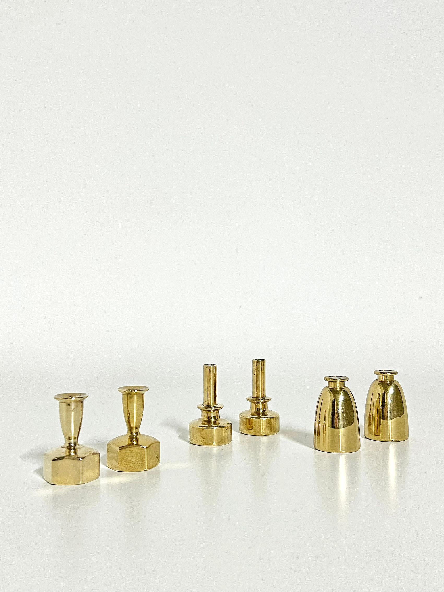 Scandinavian Modern, set of 6, candle holders in brass, Hans-Agne Jakobsson, ca 1960's.
Signed with makers mark. 

3 different measurements: 
Height: 5,2 cm, diameter: 2,8 cm. 
Height: 4,6 cm, diameter: 2,8 cm.
Height: 4,5 cm, width: 3 cm, depth: