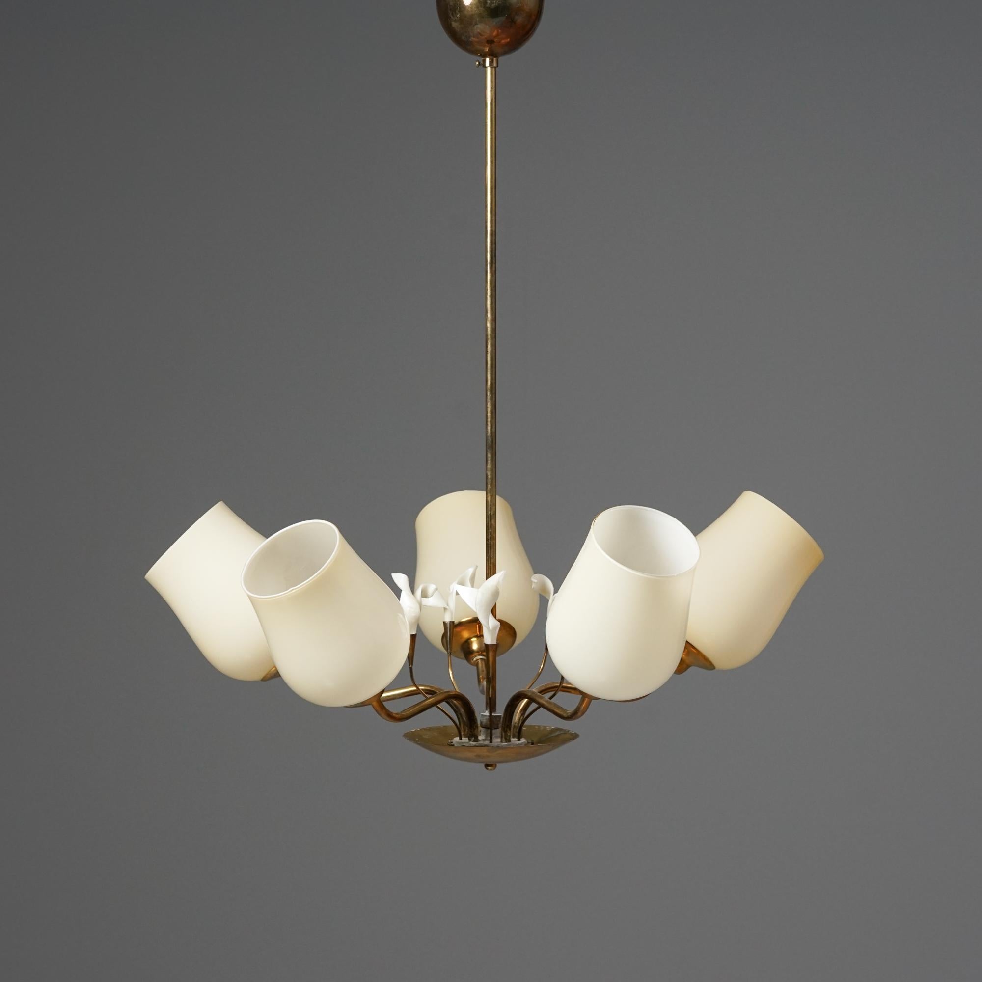 Scandinavian Modern chandelier, manufactured by KORUMO Oy, Finland, 1950s. Brass frame, opaline glass shades, plastic flowers details. Marked. Good vintage condition, minor patina consistent with age and use. 