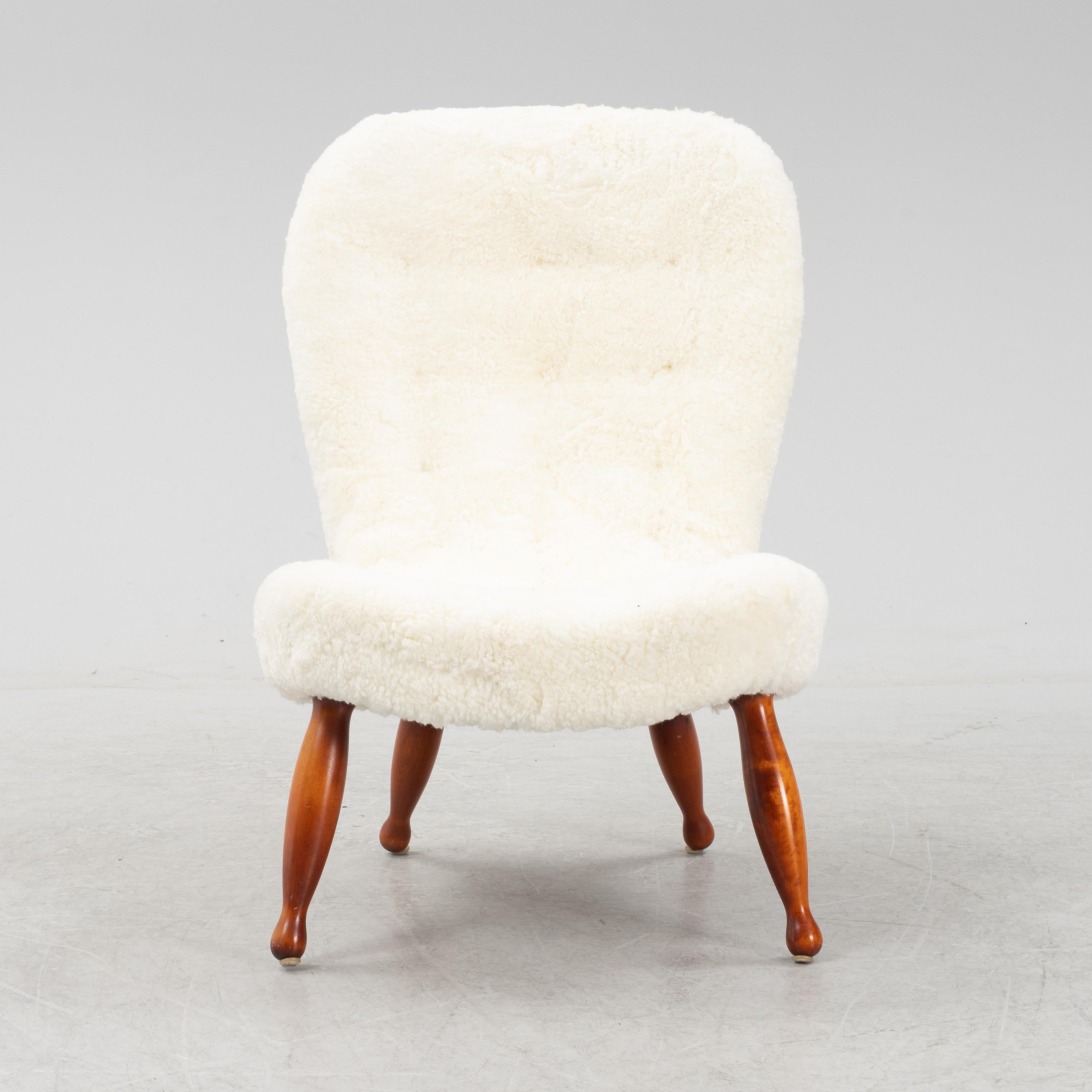 Rare easy chair (also known as Clam Chair) Attributed to Arnold Madsen for Madsen & Schubell in Denmark, 1940s.