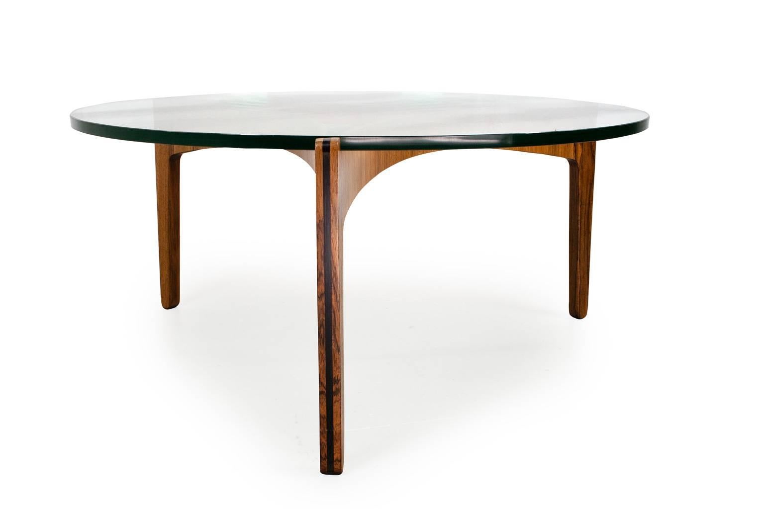 Scandinavian Modern glass and rosewood coffee table by Sven Ellekaer, 1961 produced by Christian Linneberg. In excellent condition Mid-Century Modern design. The elegant bent rosewood shows the craftsmanship of the Nordic designer and places him