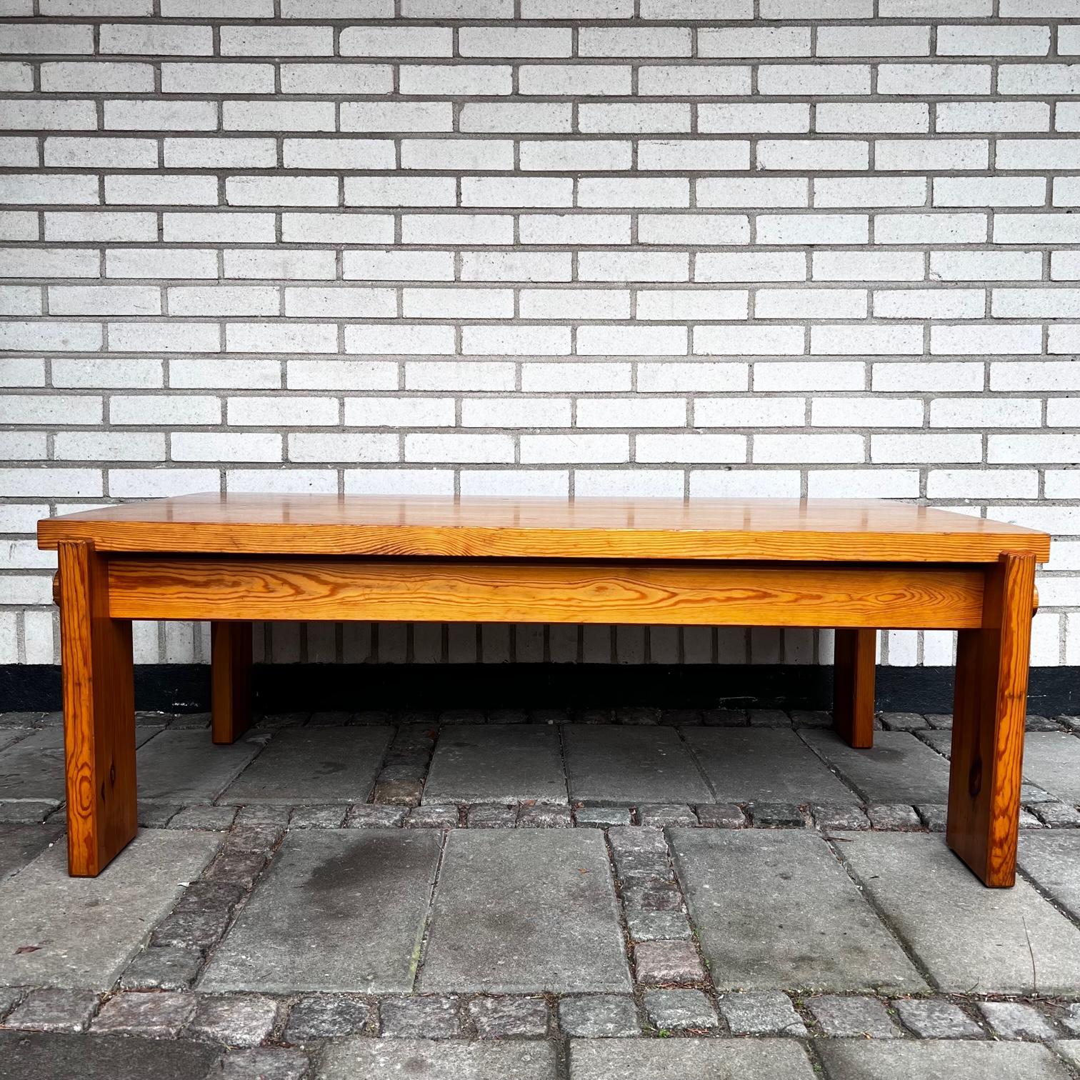 A brutalist Swedish modern coffee table in solid pine designed by Yngve Ekström for Swedese, circa 1970.

This table is made in solid pine and is mounted and dismantled by screwing on the circular details on the sides, no tools are