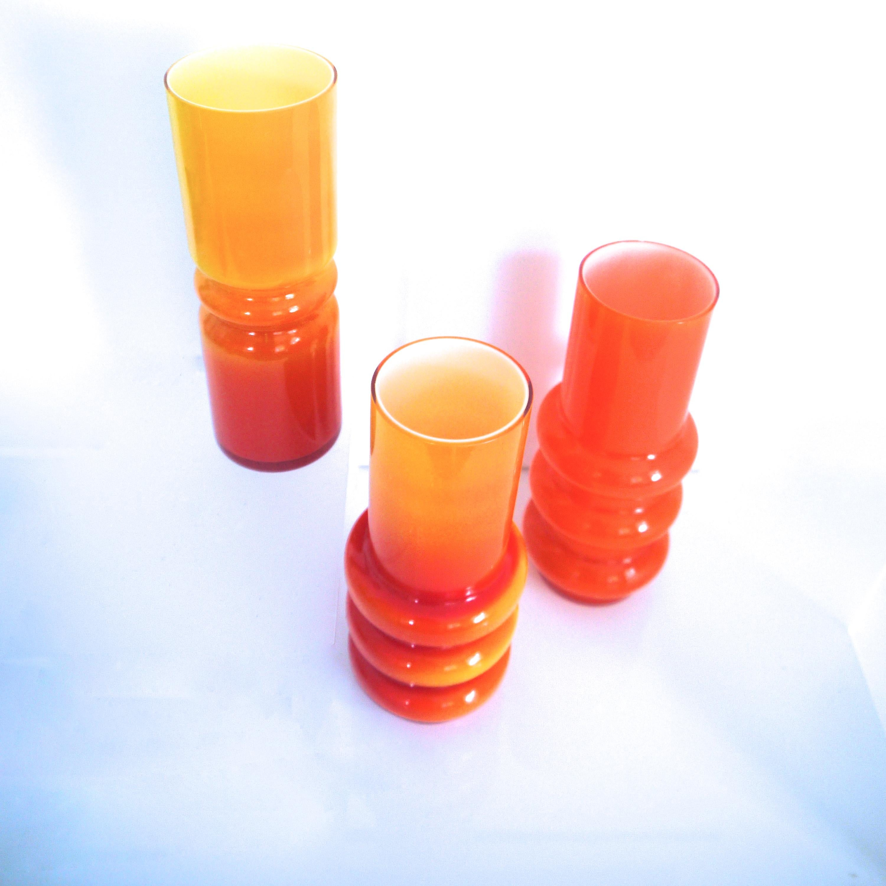 Scandinavian Modern collection of orange hooped glass vases by Ryd of Sweden mid-1970s - the set consists of three pieces.

Solid orange hooped vase
Height 20 cms, diameter 5 cms at mouth 9 cms at widest Weight 0.318 kgs

Variagated hooped