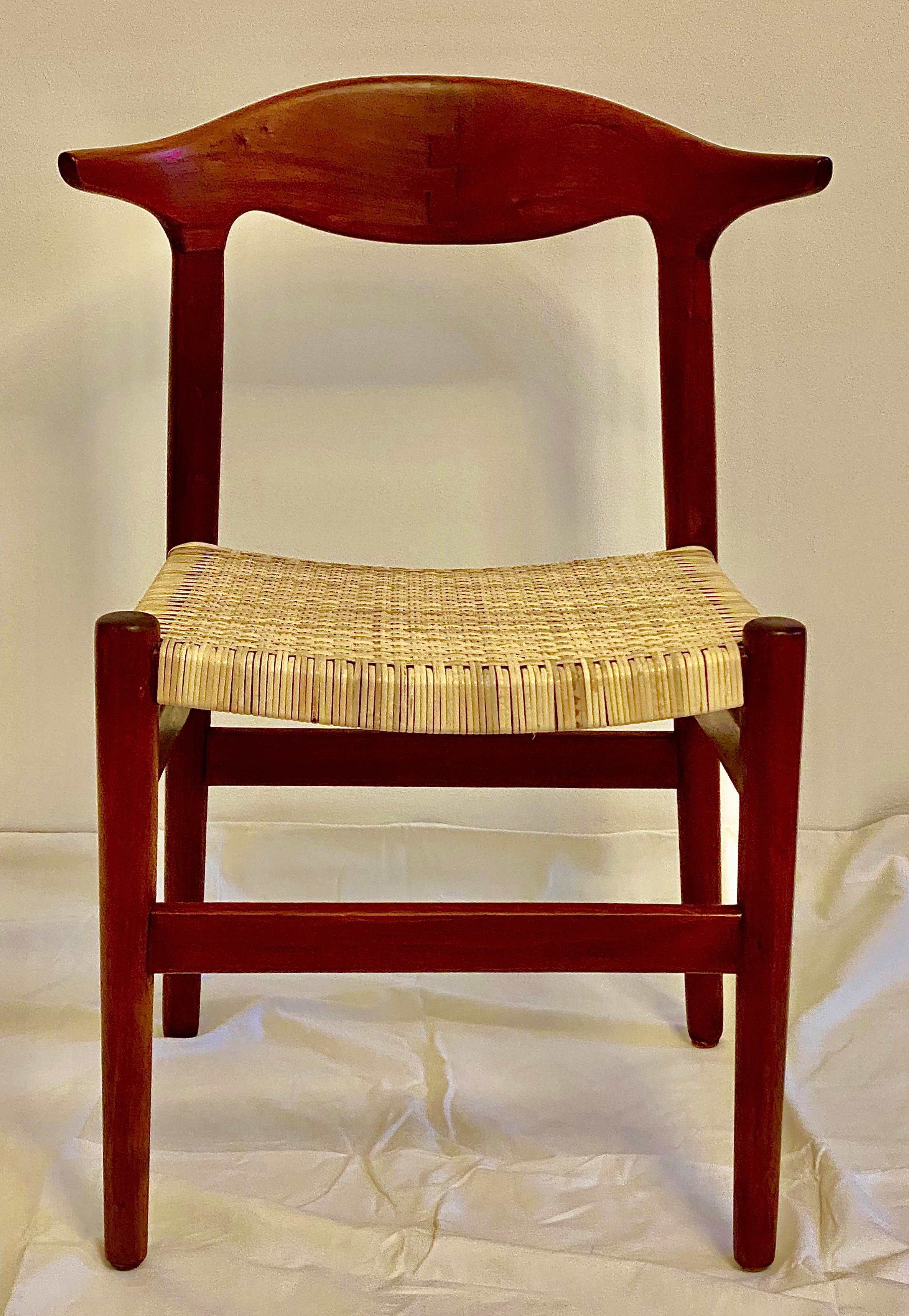 Solid hardwood frame, seat with new caning, attributed to Hans Wegner 
fully restored.
 